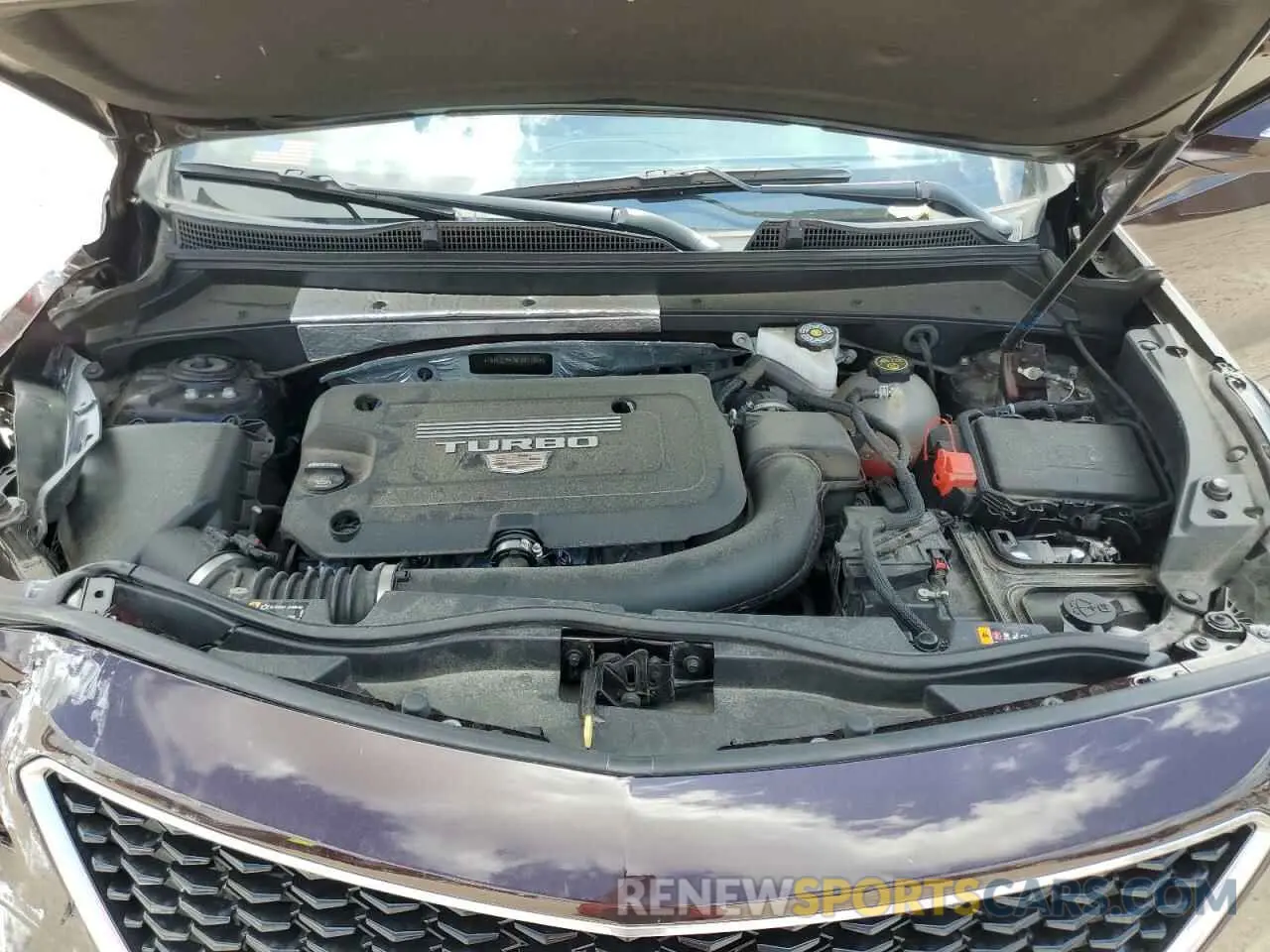 12 fotografías del automóvil dañado 1GYFZER43MF001188 CADILLAC XT4 2021