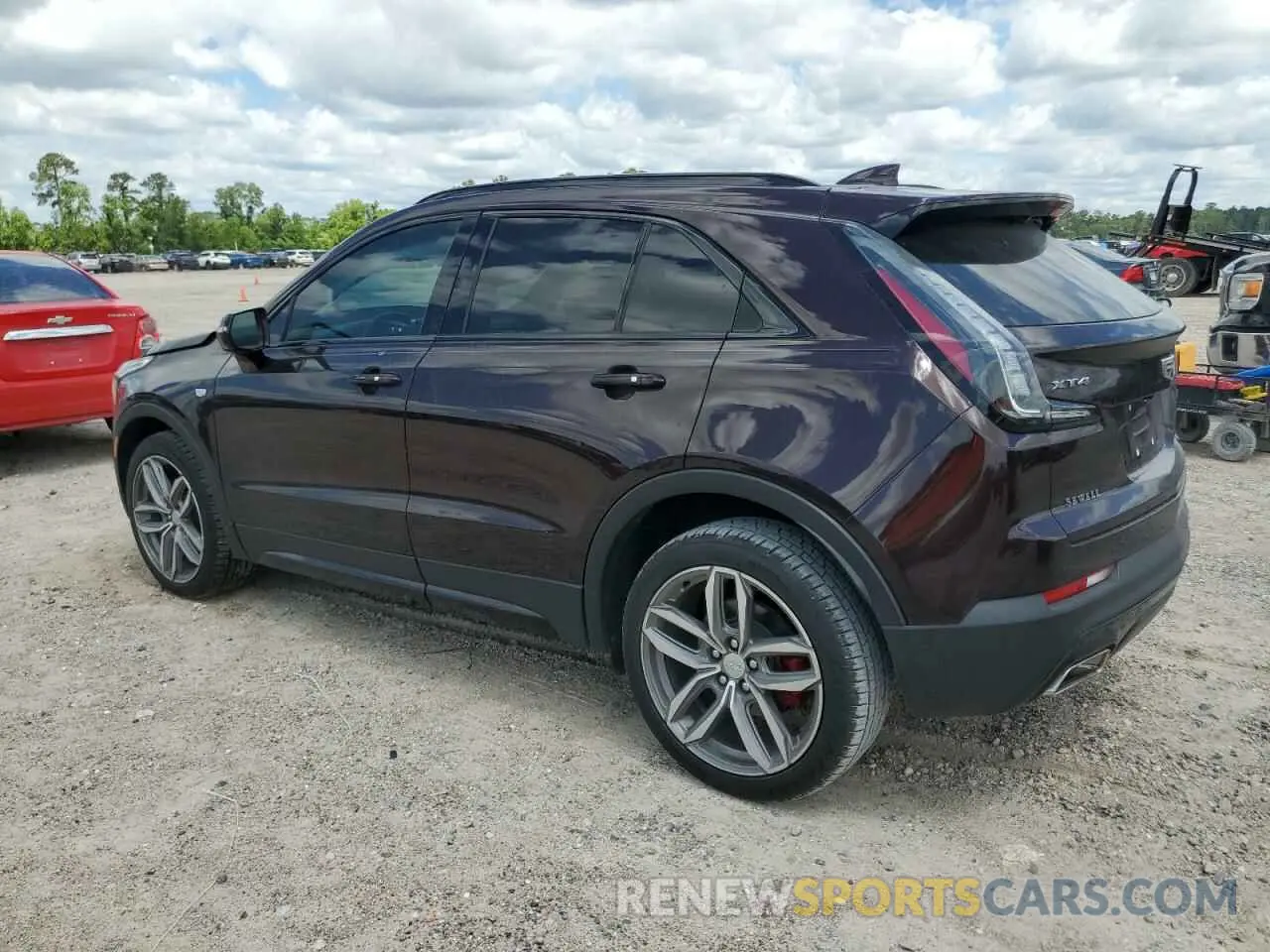 2 fotografías del automóvil dañado 1GYFZER43MF001188 CADILLAC XT4 2021