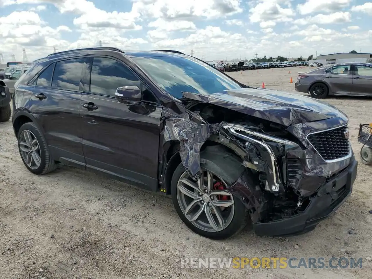 4 fotografías del automóvil dañado 1GYFZER43MF001188 CADILLAC XT4 2021