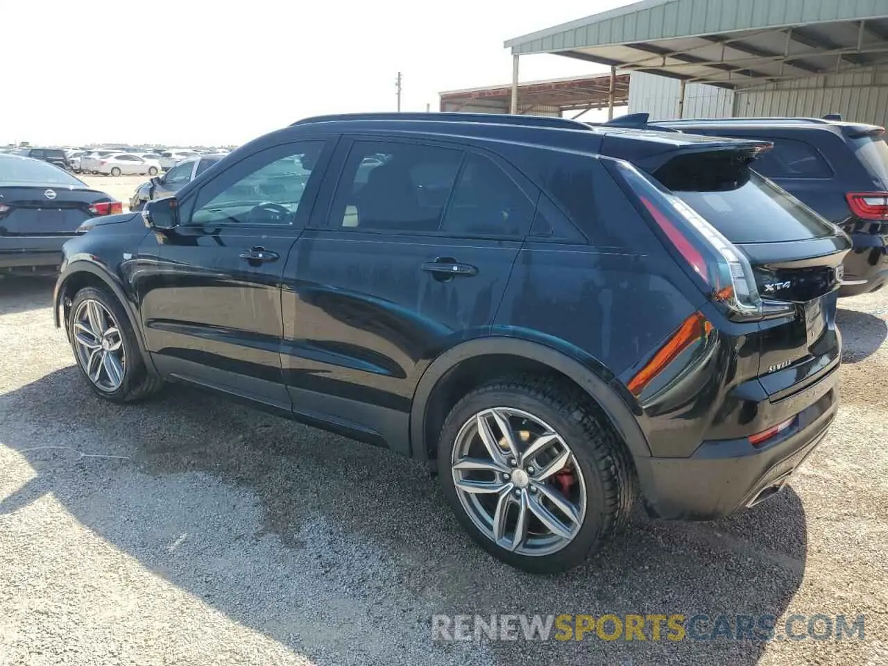 2 fotografías del automóvil dañado 1GYFZER44MF015908 CADILLAC XT4 2021
