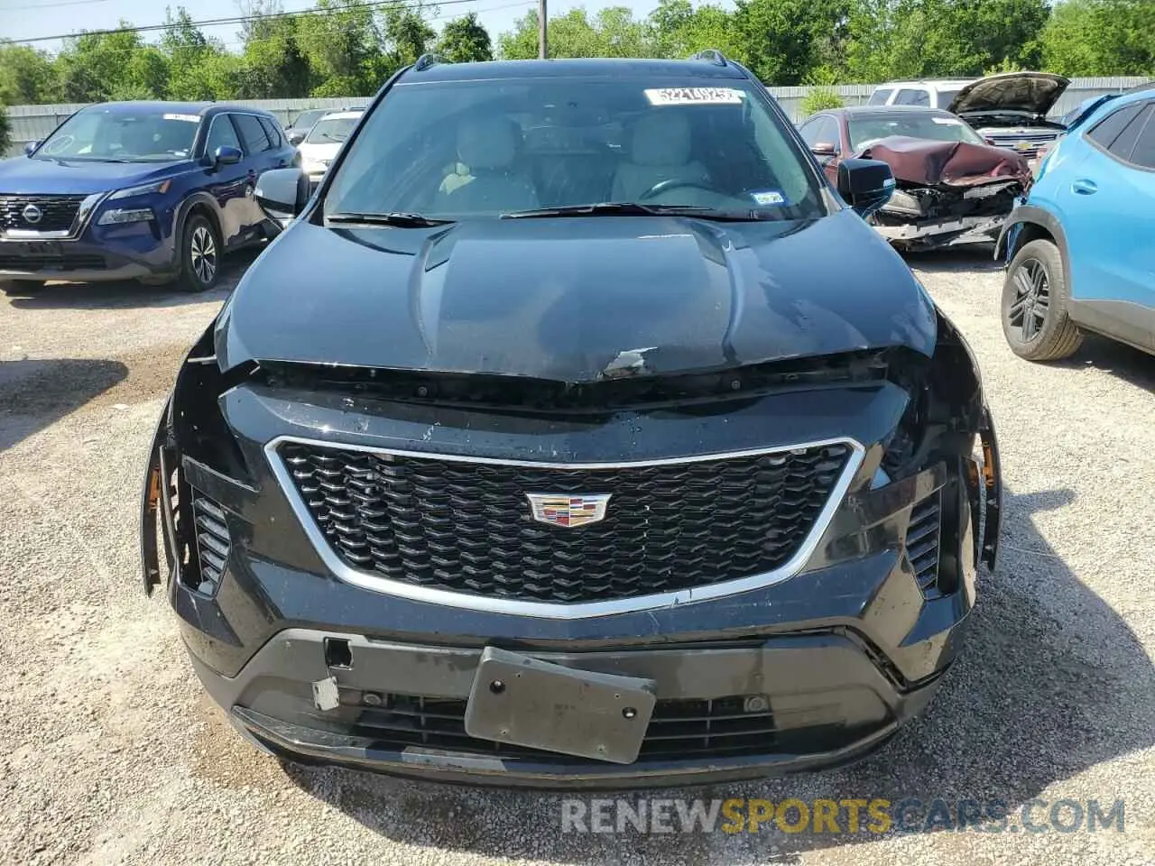 5 fotografías del automóvil dañado 1GYFZER44MF015908 CADILLAC XT4 2021