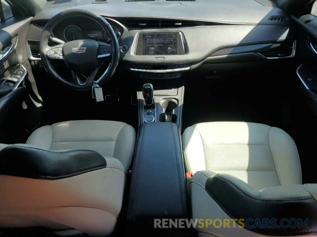 8 fotografías del automóvil dañado 1GYFZER44MF015908 CADILLAC XT4 2021