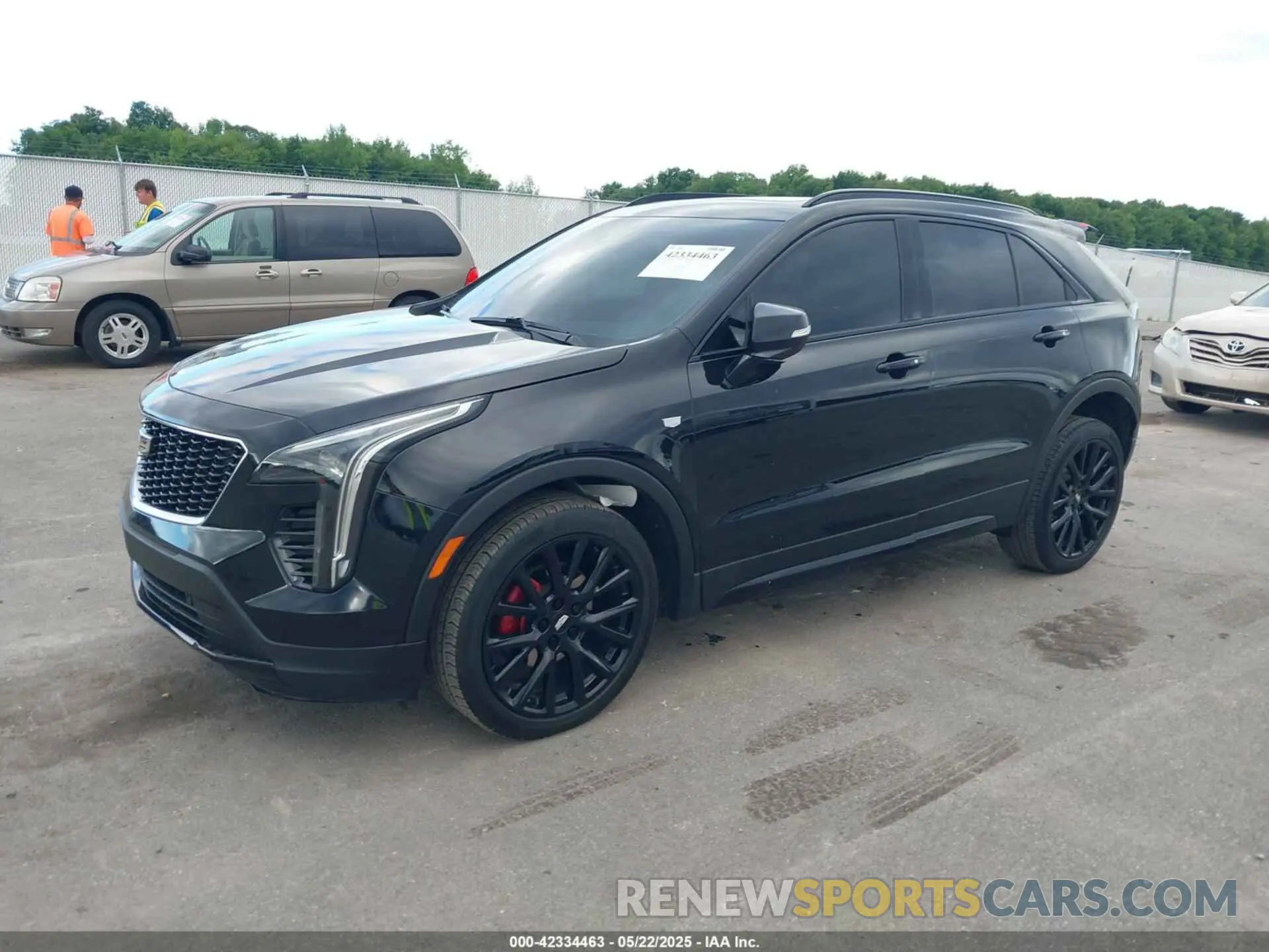 2 fotografías del automóvil dañado 1GYFZER48MF081247 CADILLAC XT4 2021