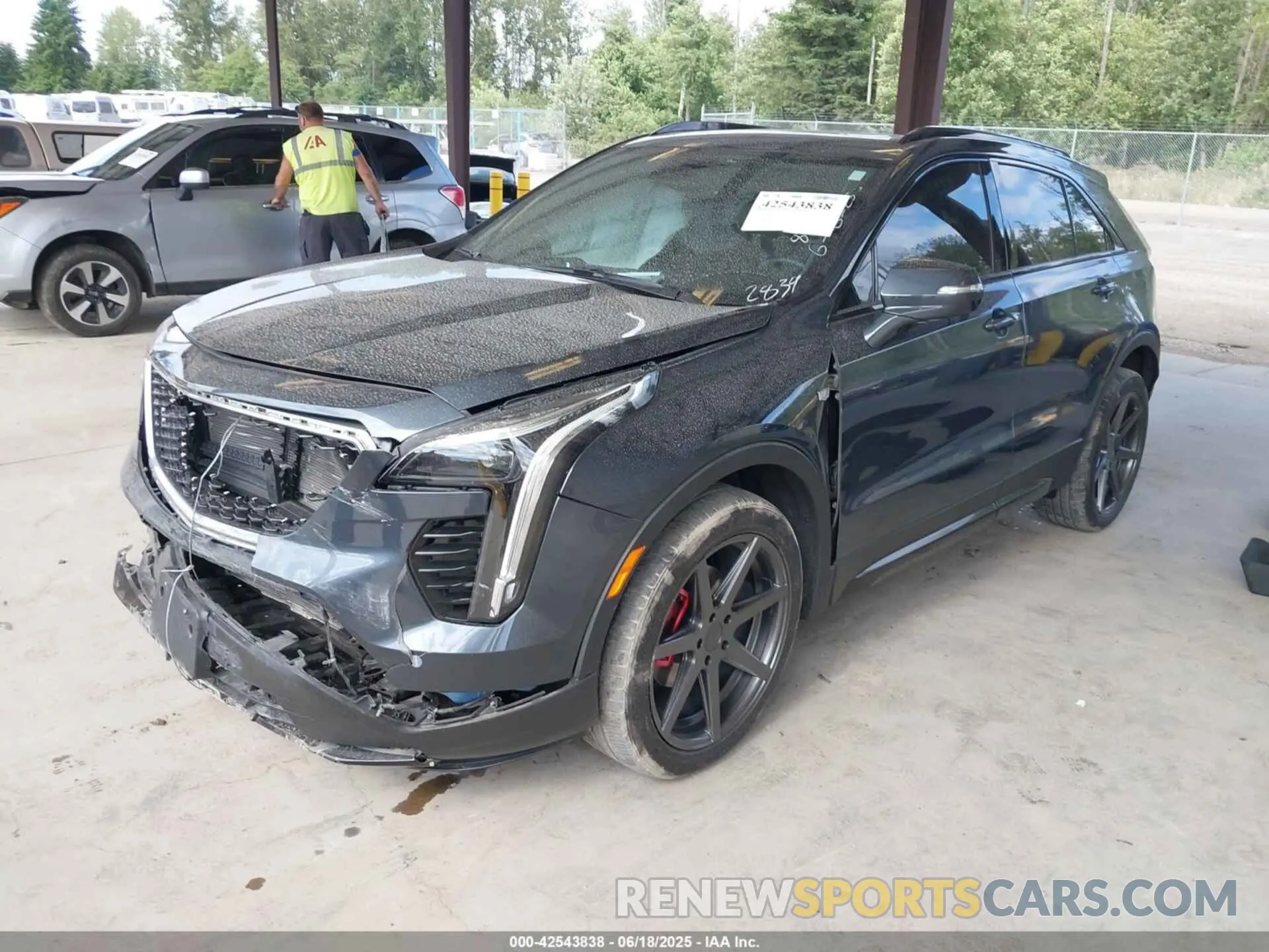 2 fotografías del automóvil dañado 1GYFZFR40MF032839 CADILLAC XT4 2021