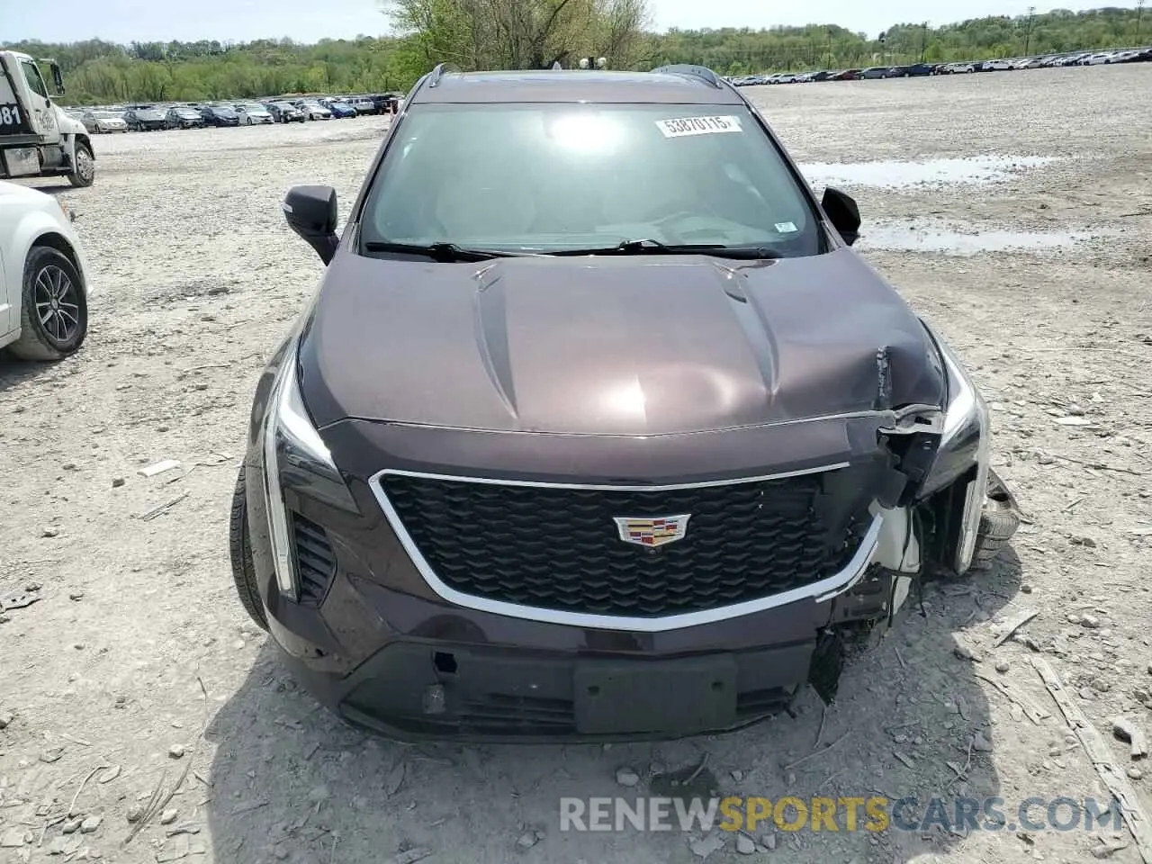 5 fotografías del automóvil dañado 1GYFZFR41MF036477 CADILLAC XT4 2021