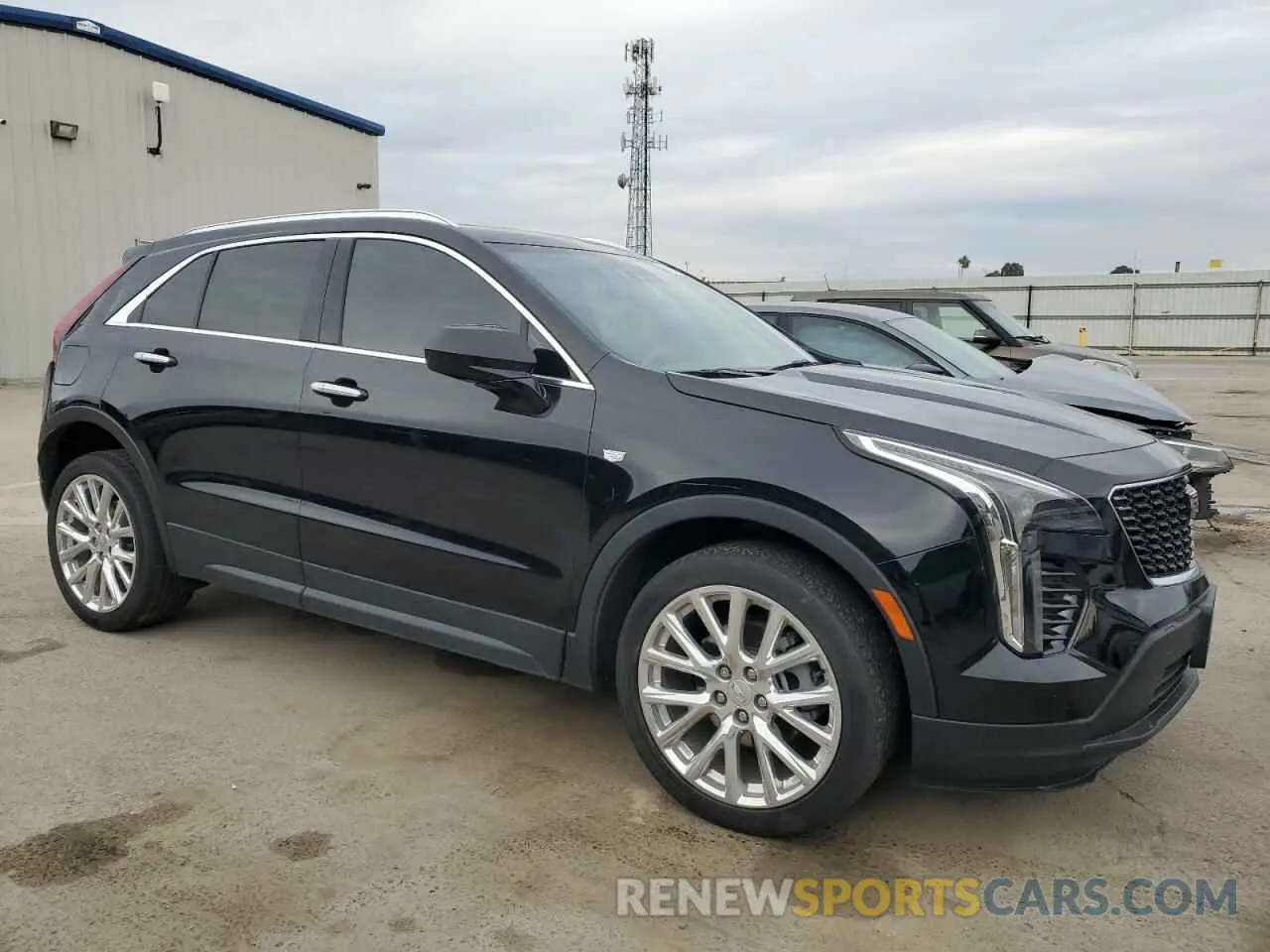 4 fotografías del automóvil dañado 1GYAZAR42NF120533 CADILLAC XT4 2022