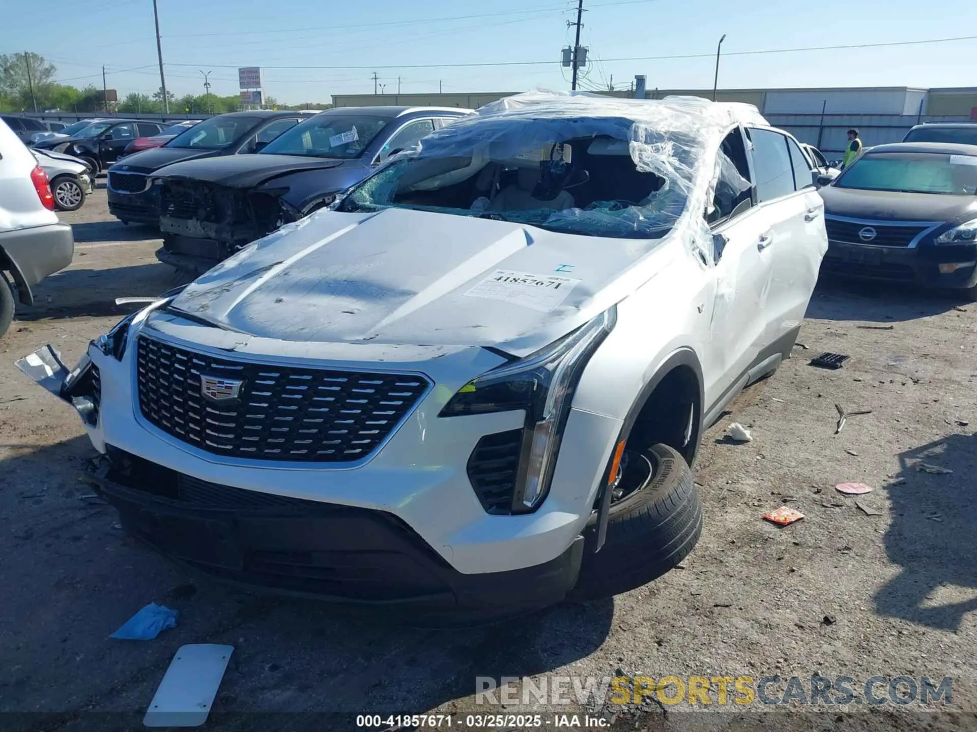 2 fotografías del automóvil dañado 1GYAZAR48NF170949 CADILLAC XT4 2022
