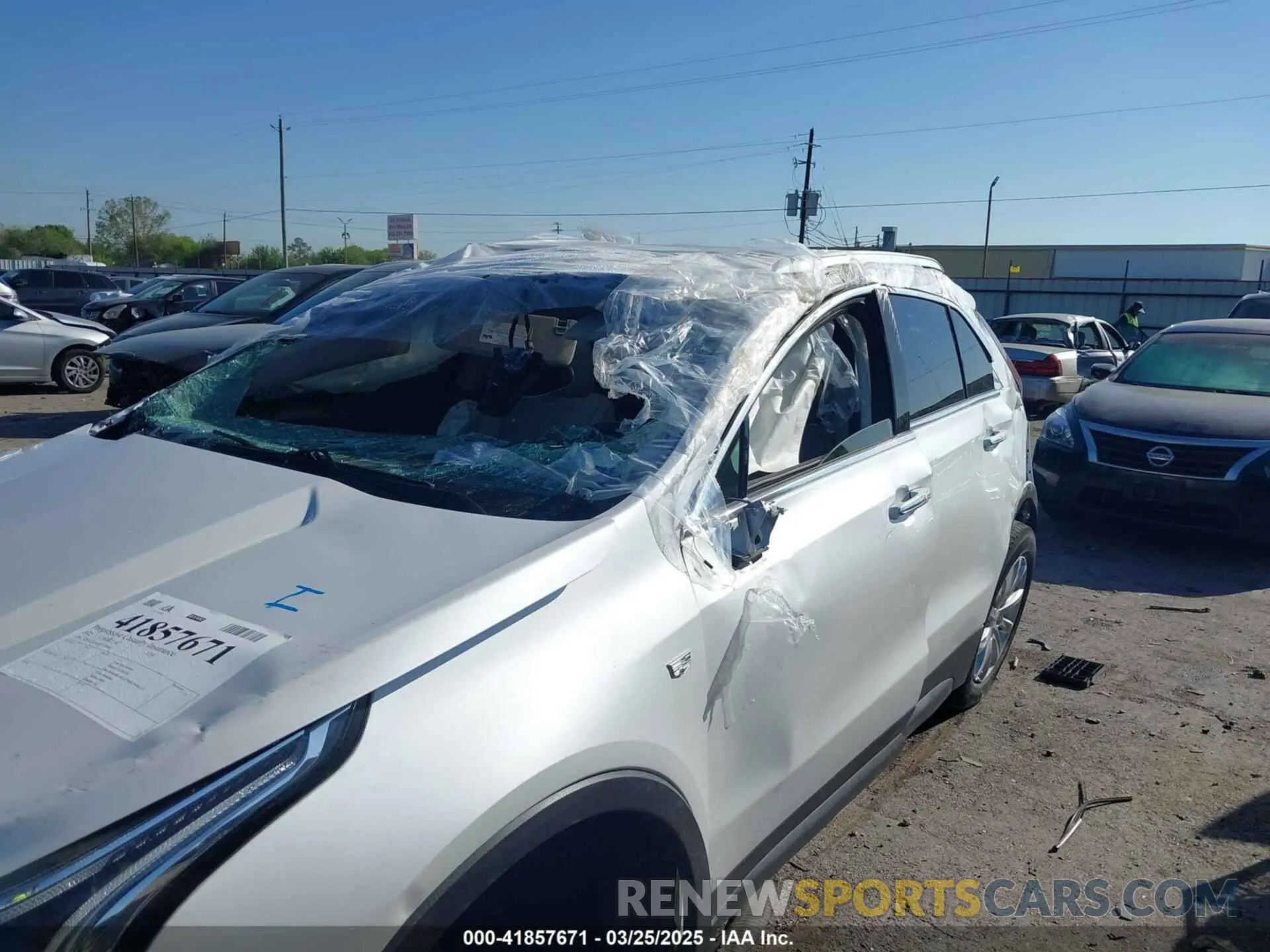 6 fotografías del automóvil dañado 1GYAZAR48NF170949 CADILLAC XT4 2022