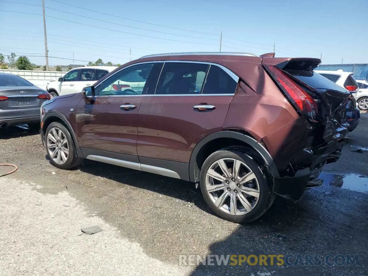 2 fotografías del automóvil dañado 1GYFZCR48NF123518 CADILLAC XT4 2022