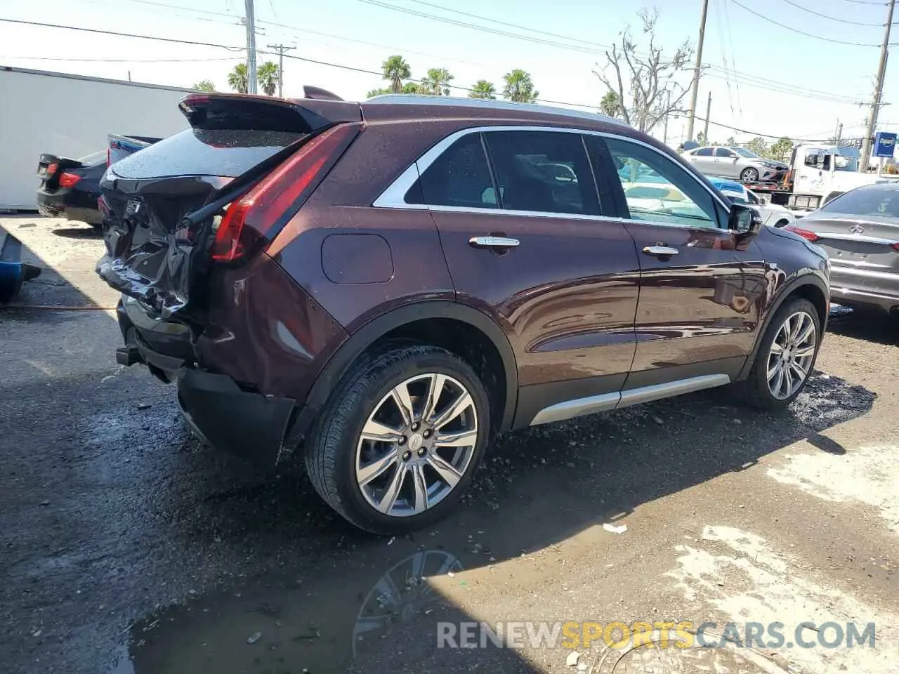 3 fotografías del automóvil dañado 1GYFZCR48NF123518 CADILLAC XT4 2022