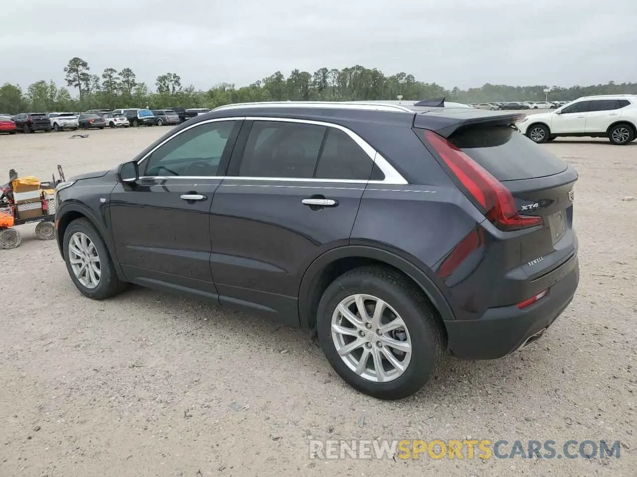 2 fotografías del automóvil dañado 1GYAZAR46PF104791 CADILLAC XT4 2023