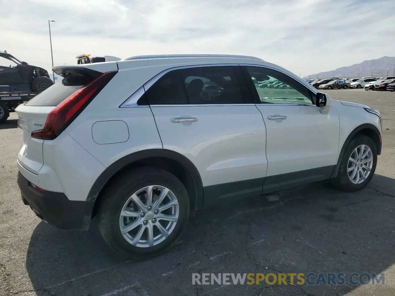 3 fotografías del automóvil dañado 1GYAZAR46PF134602 CADILLAC XT4 2023