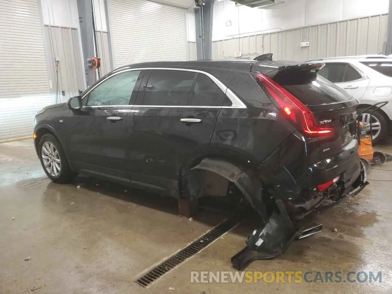 2 fotografías del automóvil dañado 1GYFZBR43PF155998 CADILLAC XT4 2023