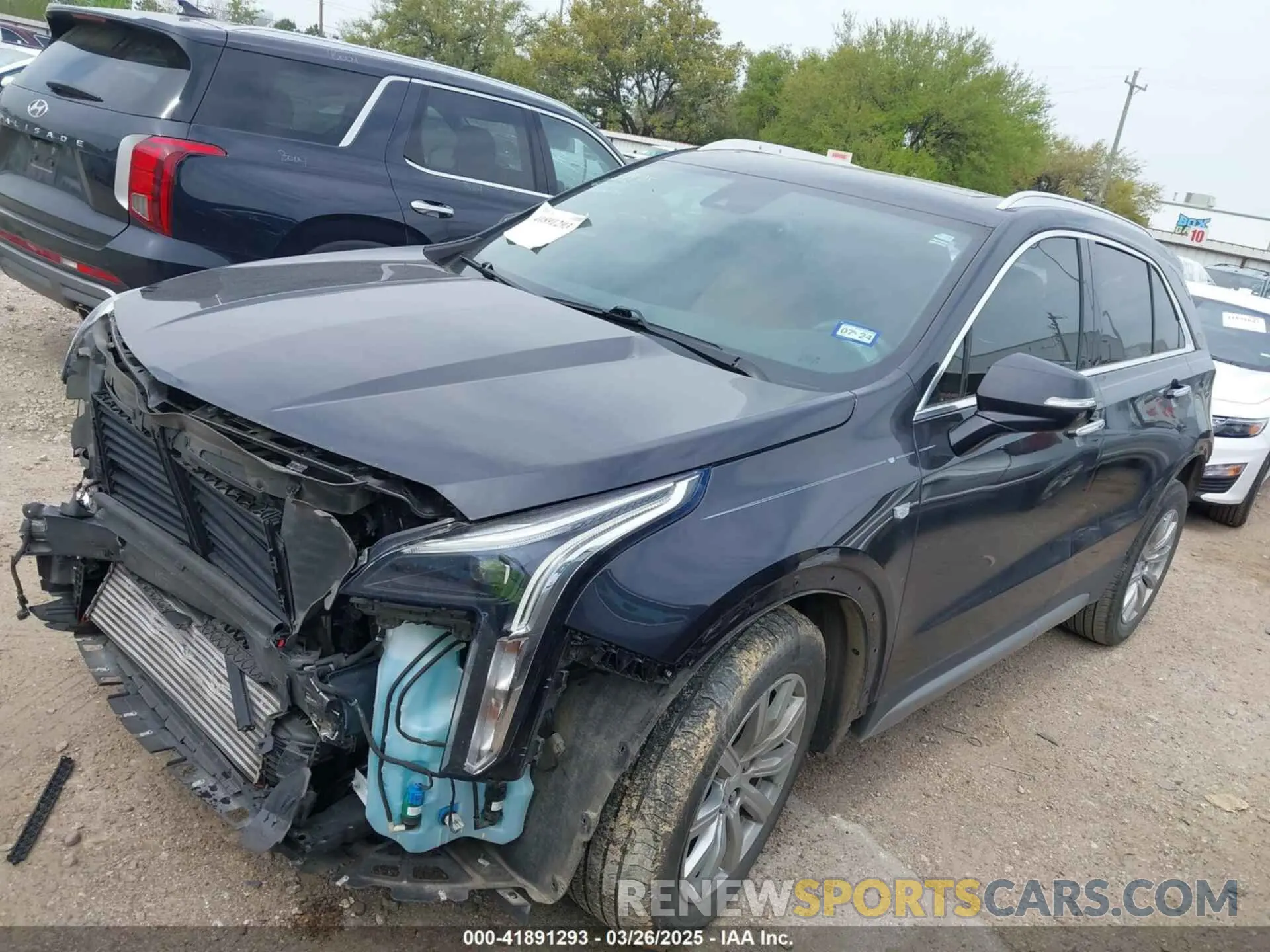 2 fotografías del automóvil dañado 1GYFZCR4XPF101409 CADILLAC XT4 2023