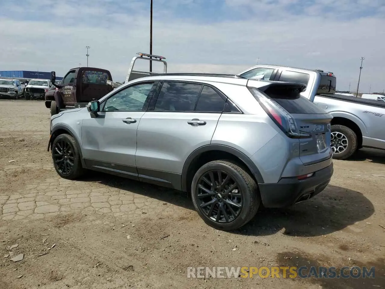 2 fotografías del automóvil dañado 1GYFZFR4XPF218294 CADILLAC XT4 2023