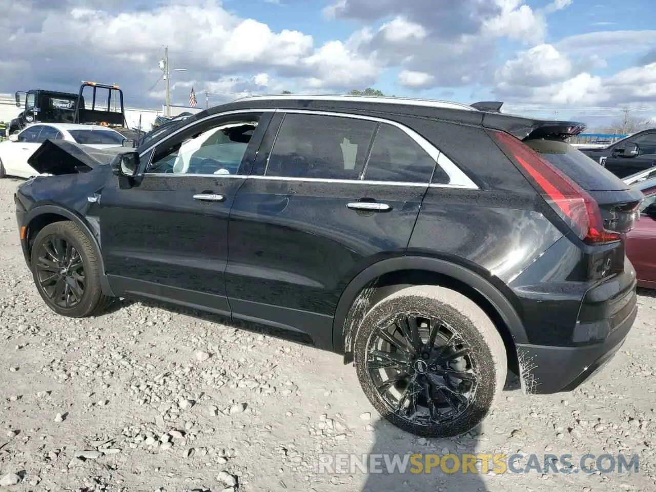 2 fotografías del automóvil dañado 1GYFZCR40SF126201 CADILLAC XT4 2025