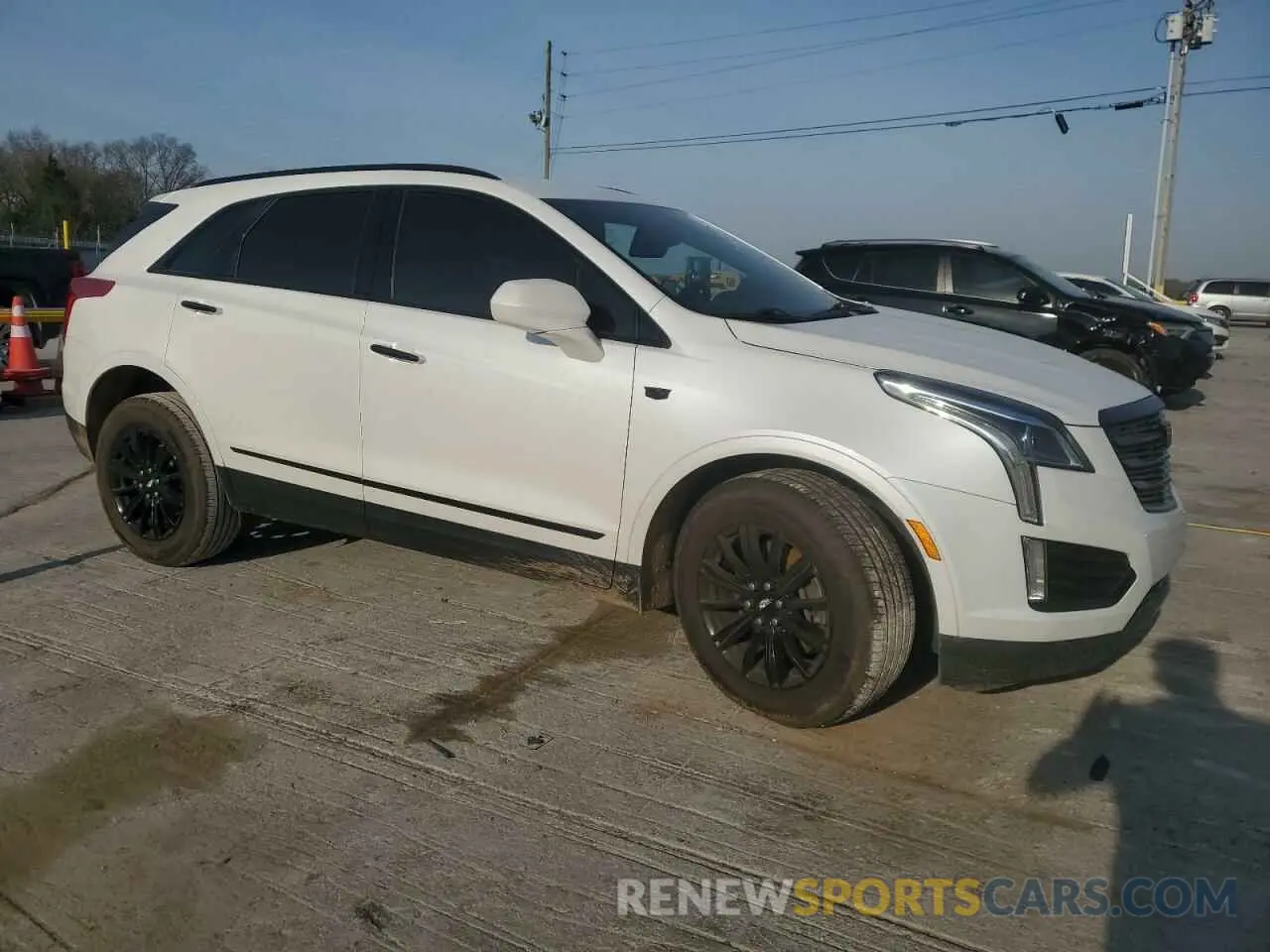 4 fotografías del automóvil dañado 1GYKNARSXKZ101883 CADILLAC XT5 2019