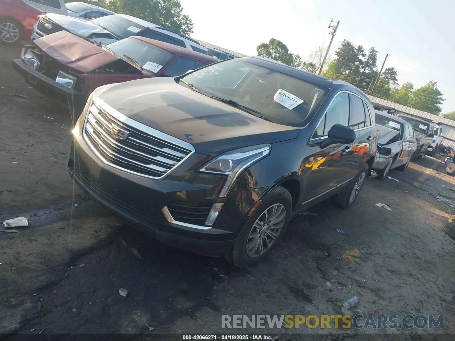 2 fotografías del automóvil dañado 1GYKNCRS2KZ251207 CADILLAC XT5 2019