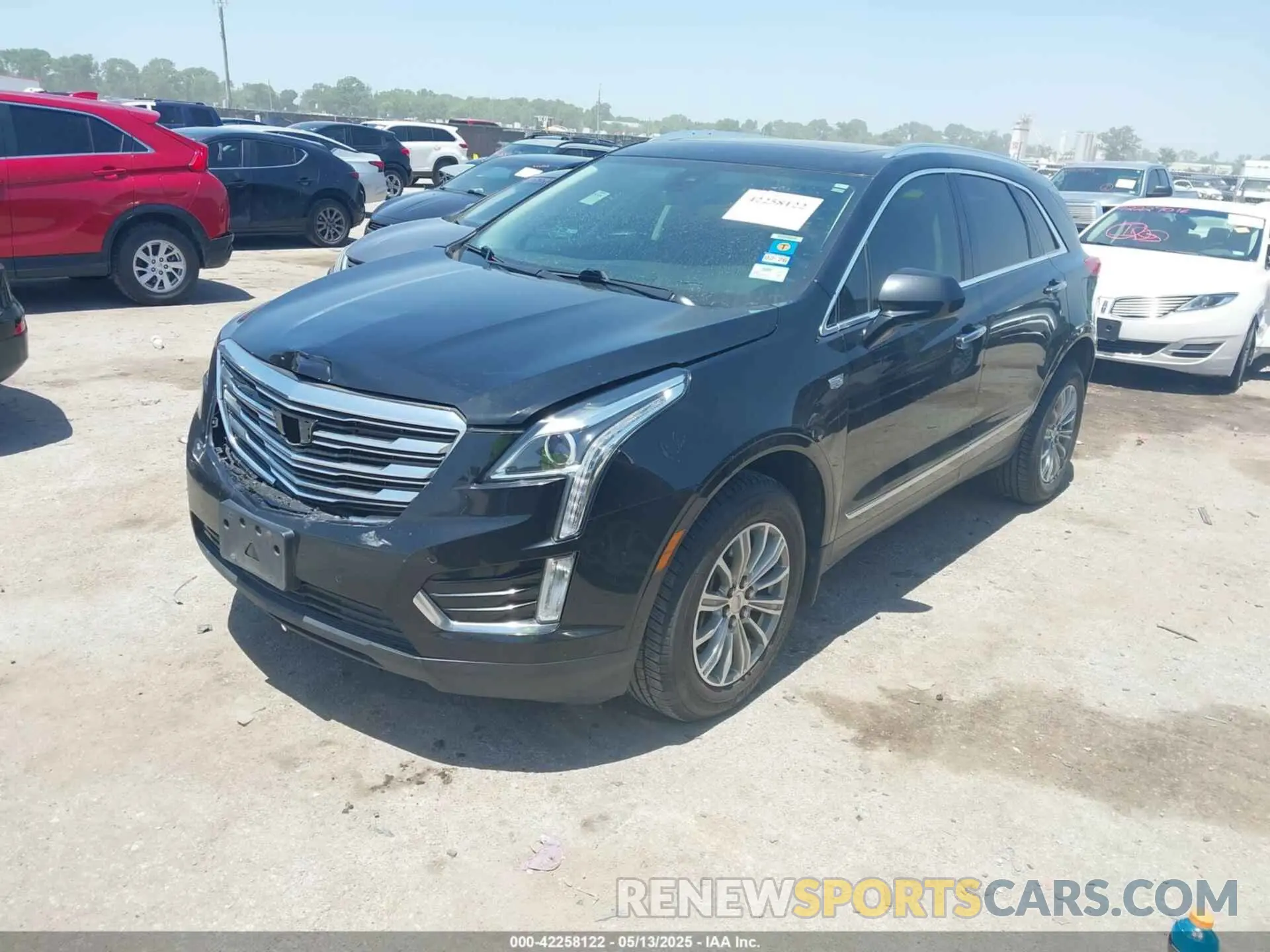2 fotografías del automóvil dañado 1GYKNCRS7KZ119625 CADILLAC XT5 2019