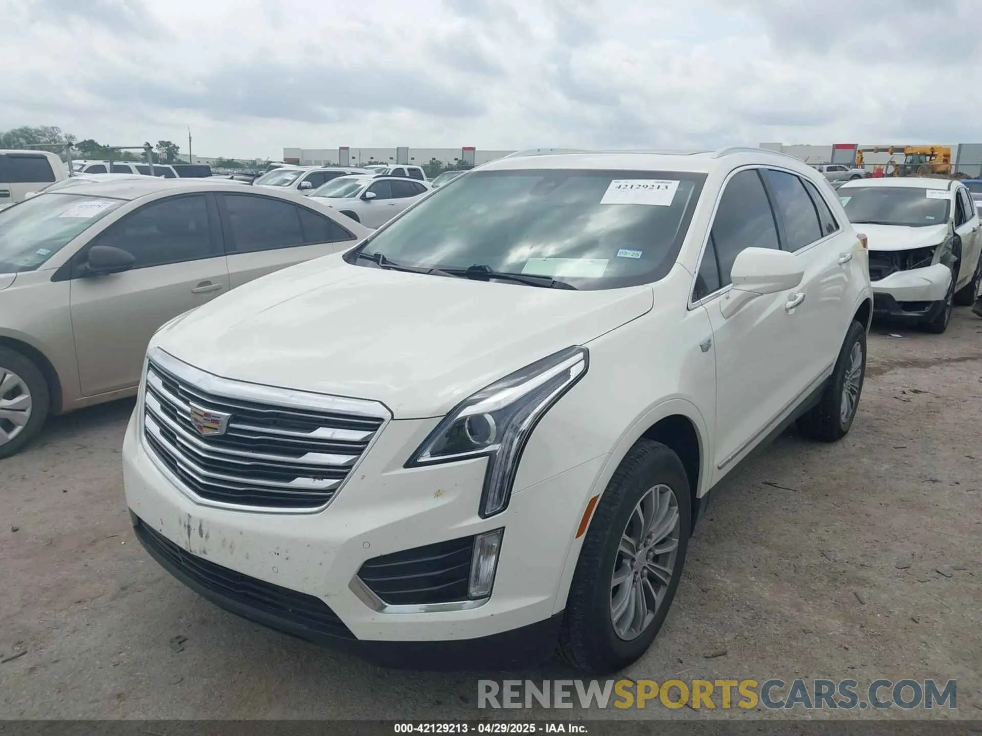 2 fotografías del automóvil dañado 1GYKNCRSXKZ286643 CADILLAC XT5 2019