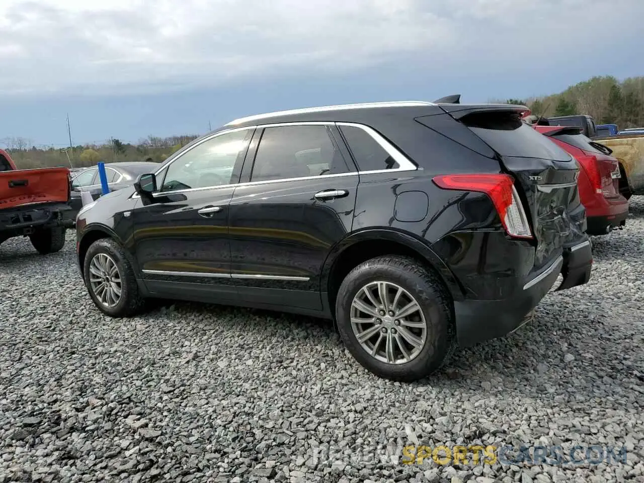2 fotografías del automóvil dañado 1GYKNDRS4KZ185376 CADILLAC XT5 2019