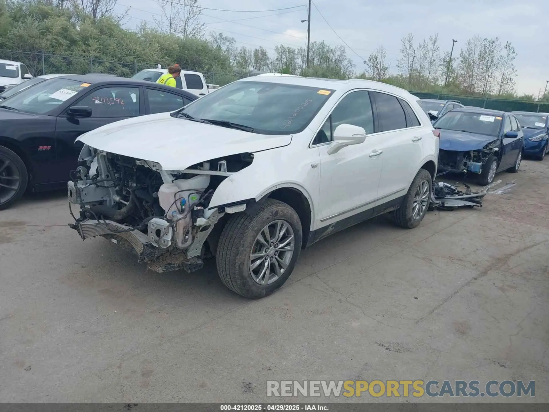 2 fotografías del automóvil dañado 1GYKNCR49LZ239803 CADILLAC XT5 2020