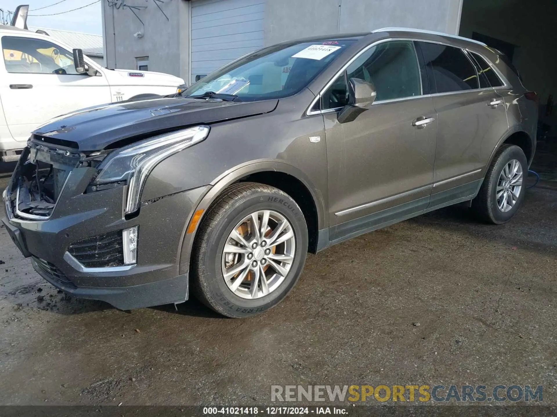 2 fotografías del automóvil dañado 1GYKNCRS0LZ122920 CADILLAC XT5 2020