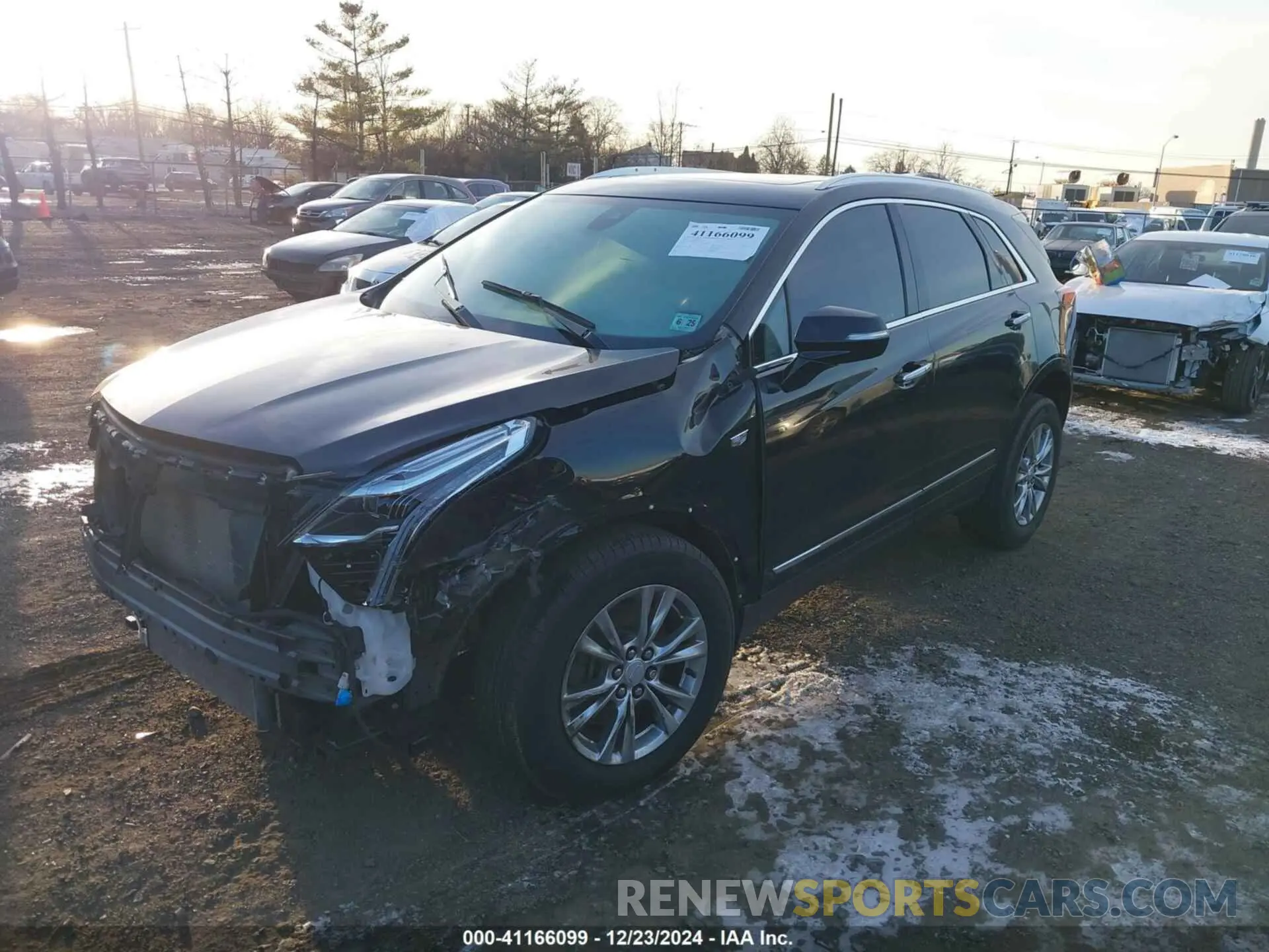2 fotografías del automóvil dañado 1GYKNDRSXLZ209939 CADILLAC XT5 2020