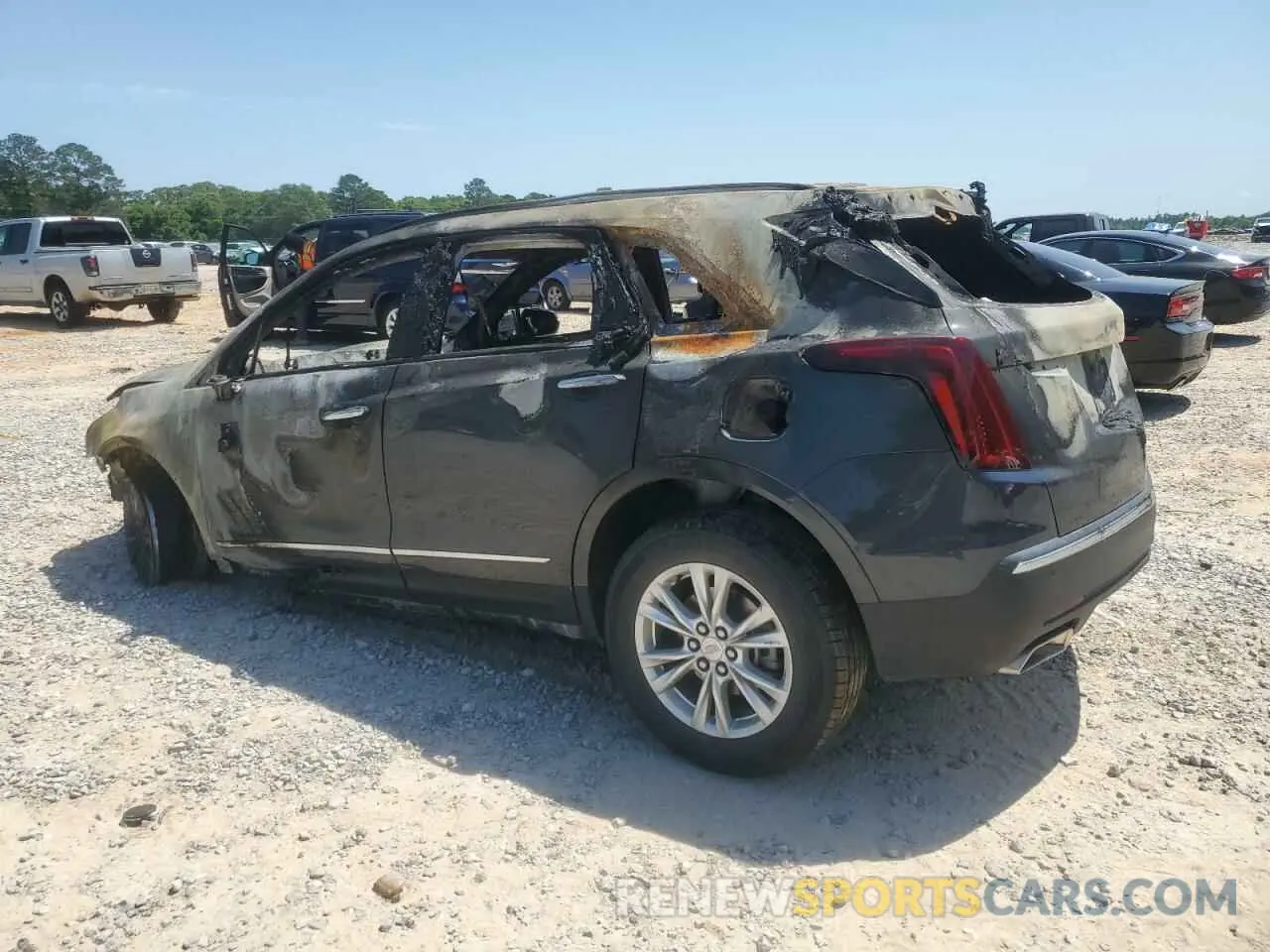 2 fotografías del automóvil dañado 1GYKNAR40MZ144522 CADILLAC XT5 2021