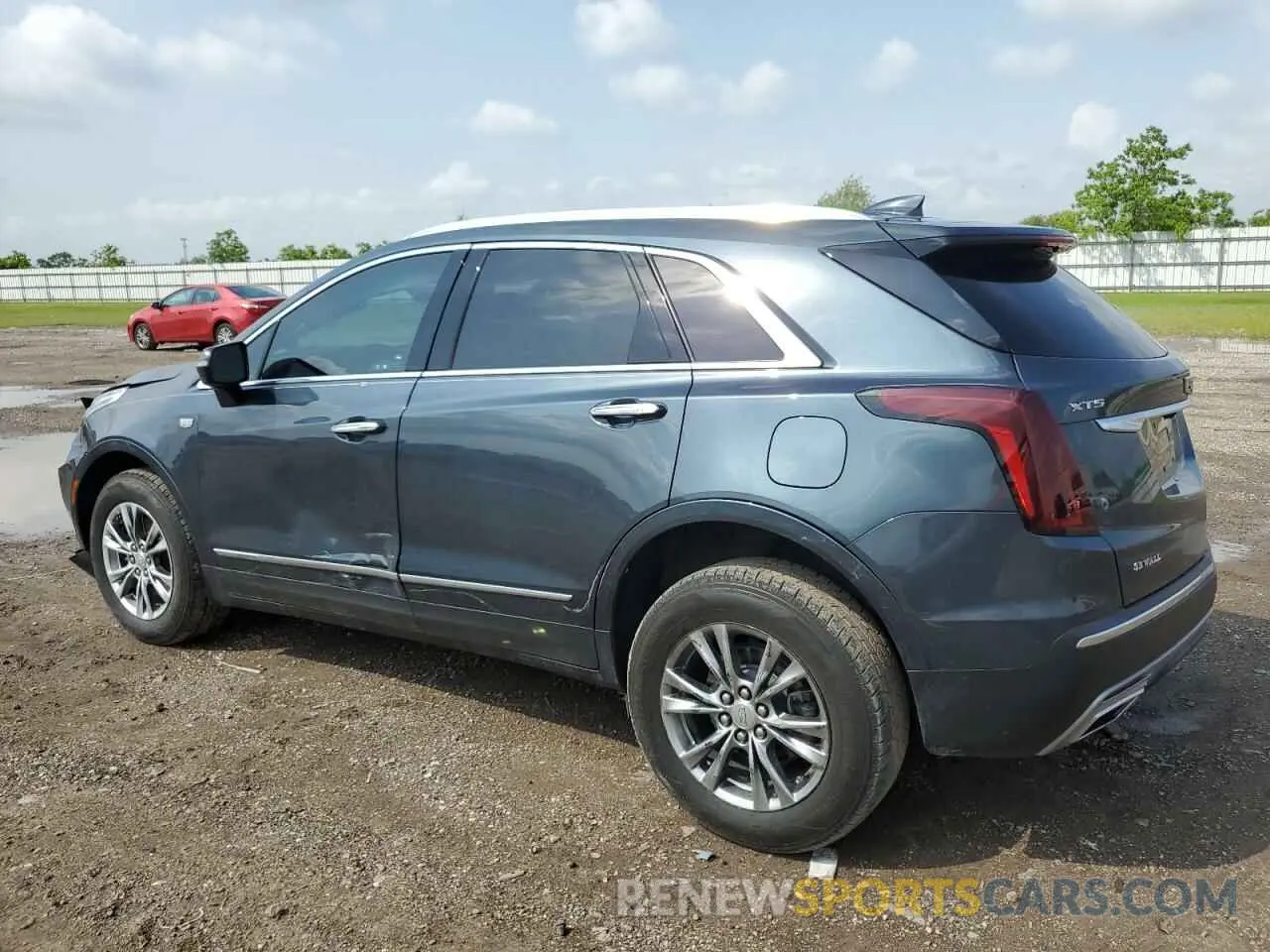2 fotografías del automóvil dañado 1GYKNCRSXMZ118083 CADILLAC XT5 2021