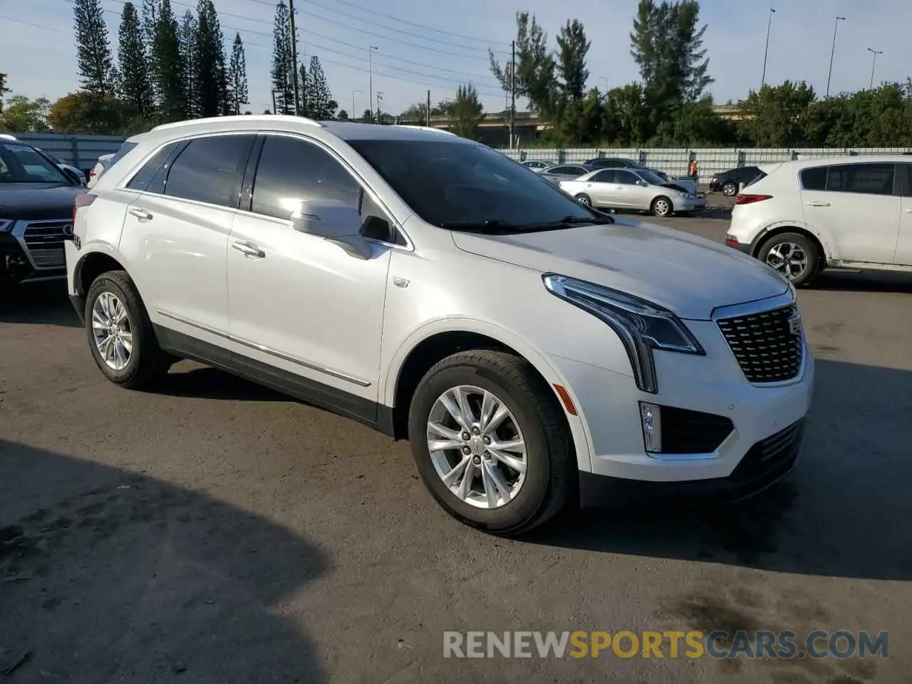 4 fotografías del automóvil dañado 1GYKNAR49NZ118633 CADILLAC XT5 2022