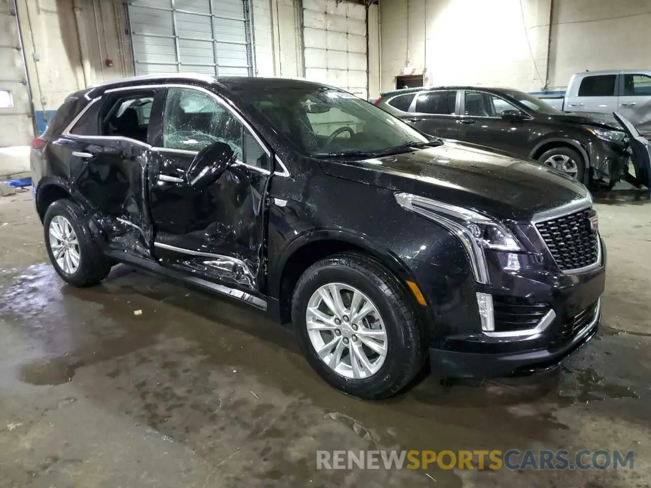 4 fotografías del automóvil dañado 1GYKNBR46NZ173918 CADILLAC XT5 2022