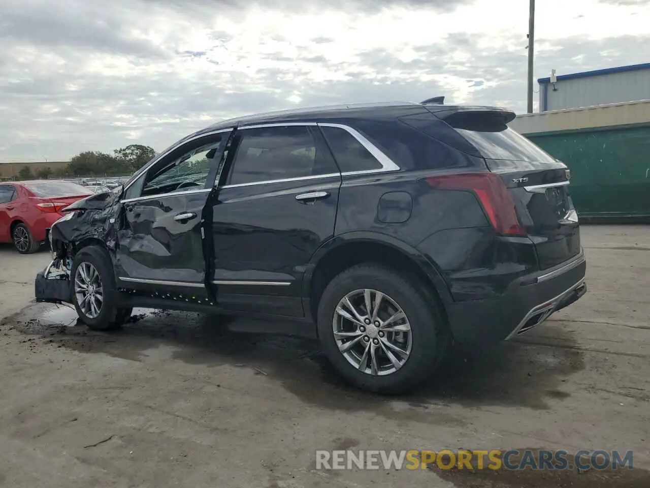 2 fotografías del automóvil dañado 1GYKNCRS0PZ138704 CADILLAC XT5 2023