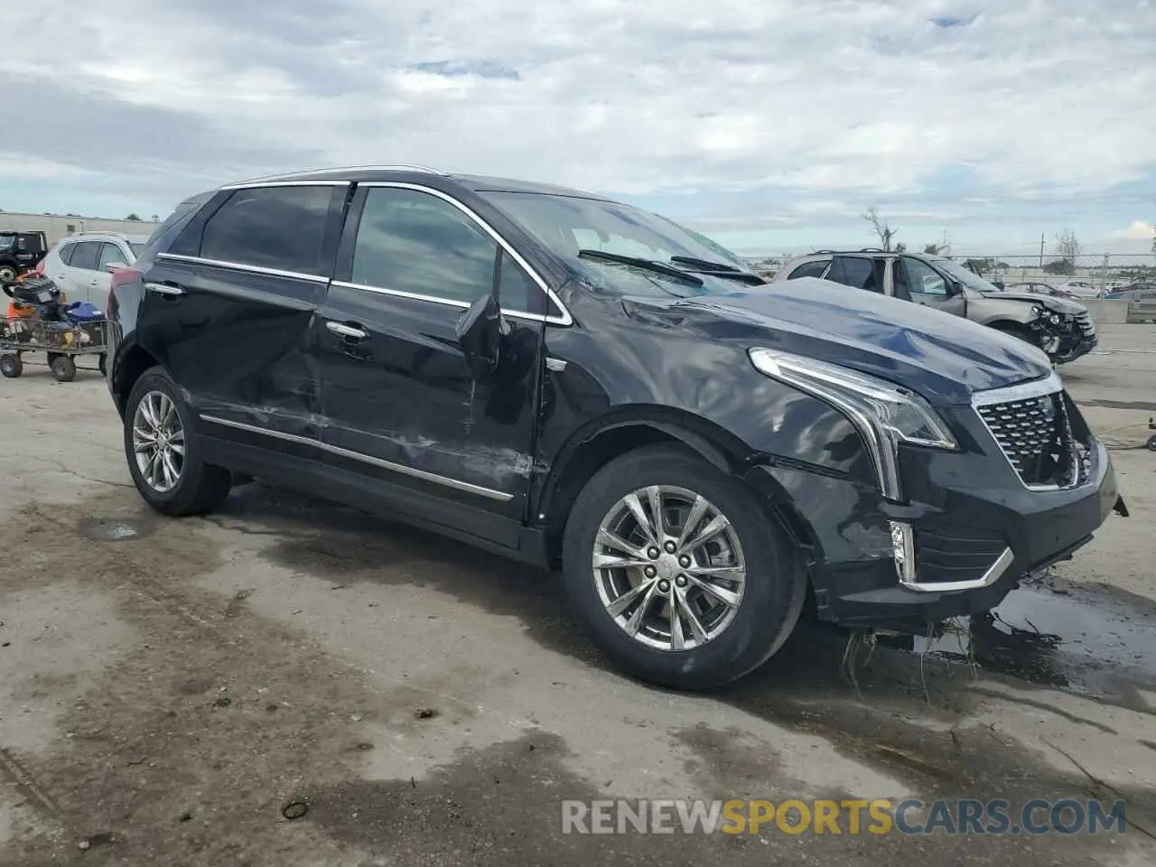 4 fotografías del automóvil dañado 1GYKNCRS0PZ138704 CADILLAC XT5 2023