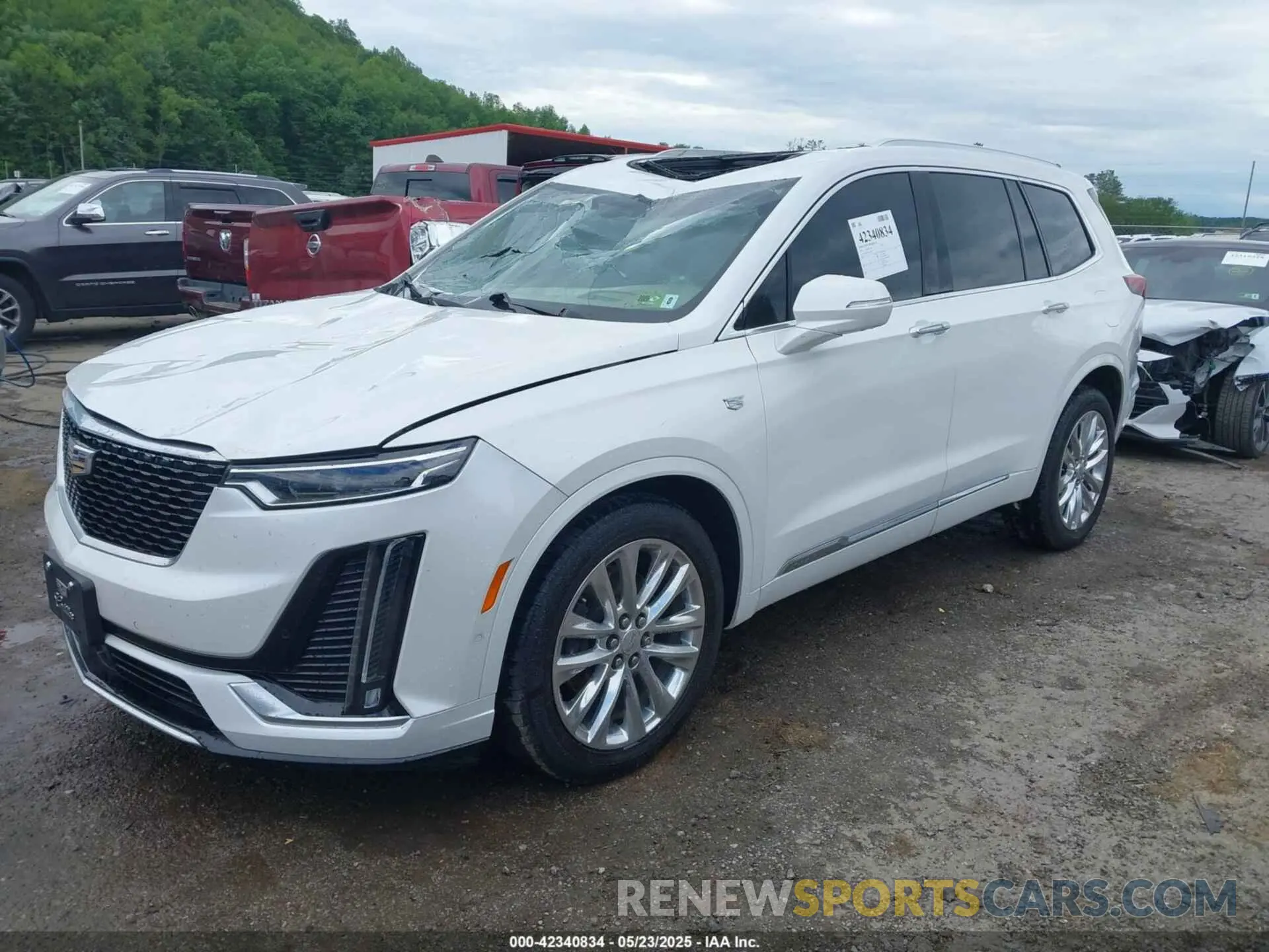 2 fotografías del automóvil dañado 1GYKPFRS0LZ212659 CADILLAC XT6 2020