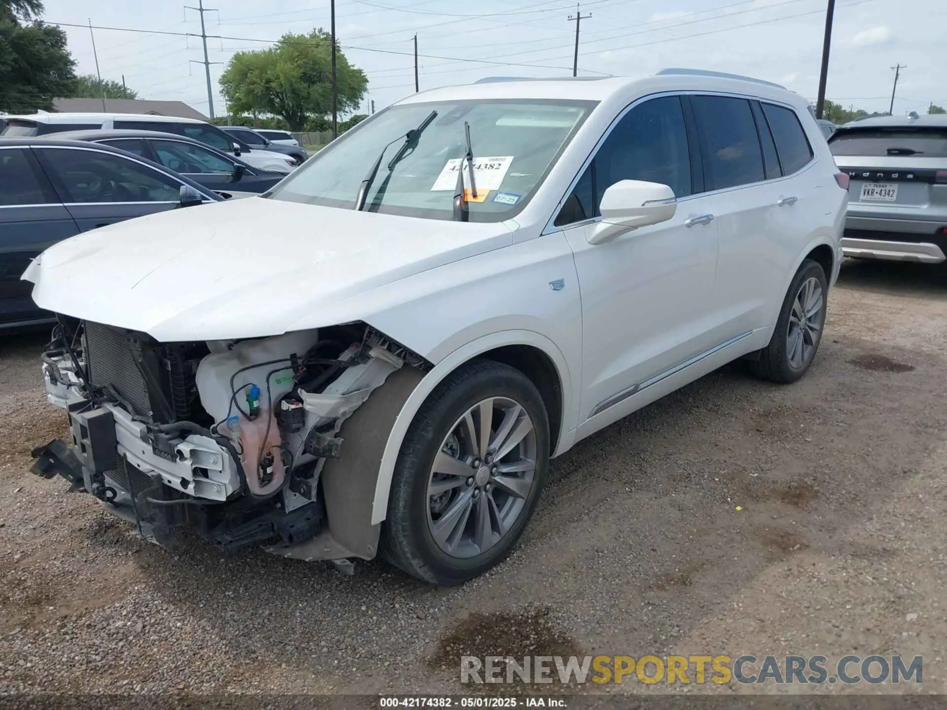 2 fotografías del automóvil dañado 1GYKPCRS2NZ161800 CADILLAC XT6 2022