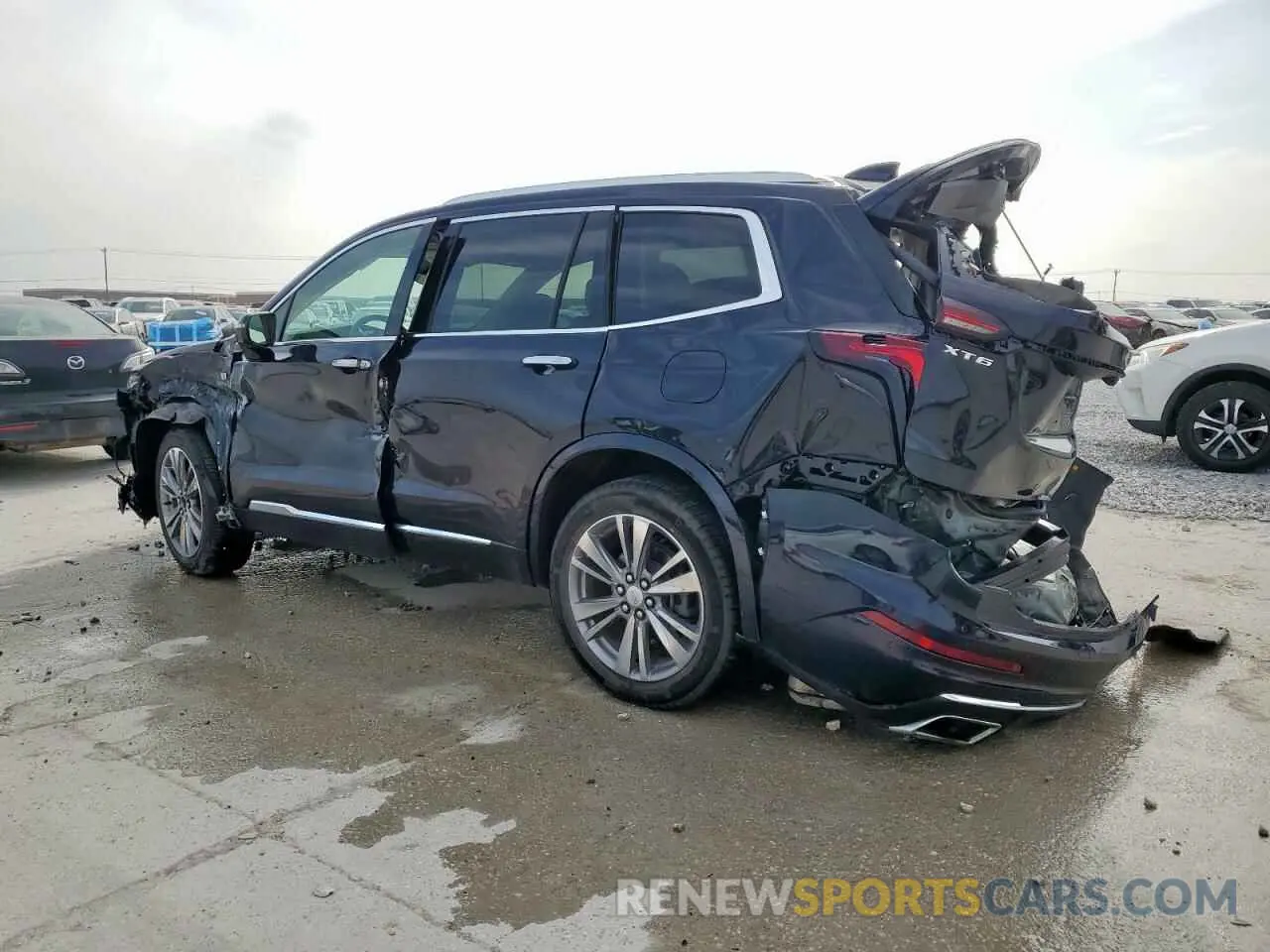 2 fotografías del automóvil dañado 1GYKPCRS9NZ107393 CADILLAC XT6 2022
