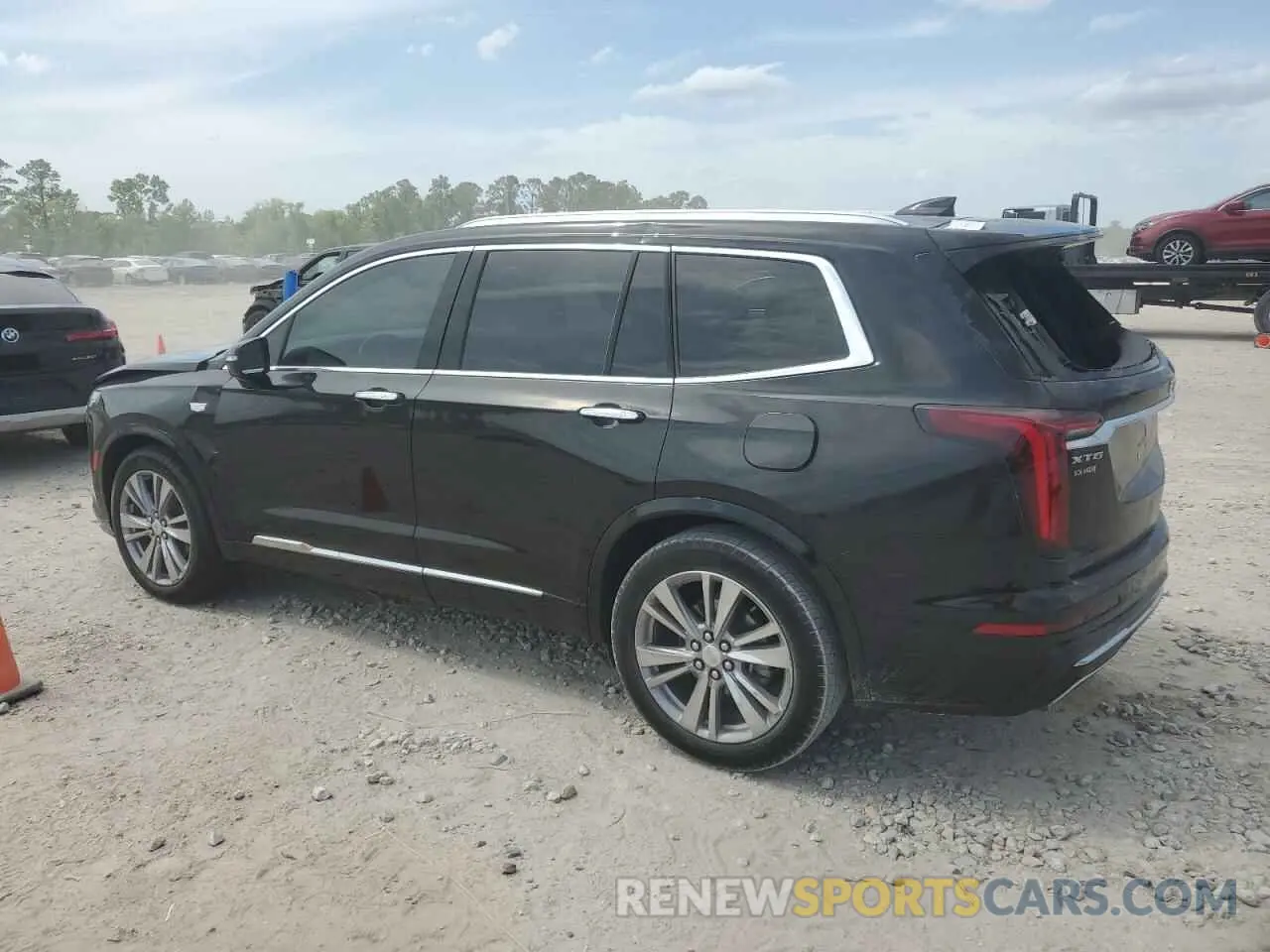 2 fotografías del automóvil dañado 1GYKPCRS6PZ127331 CADILLAC XT6 2023