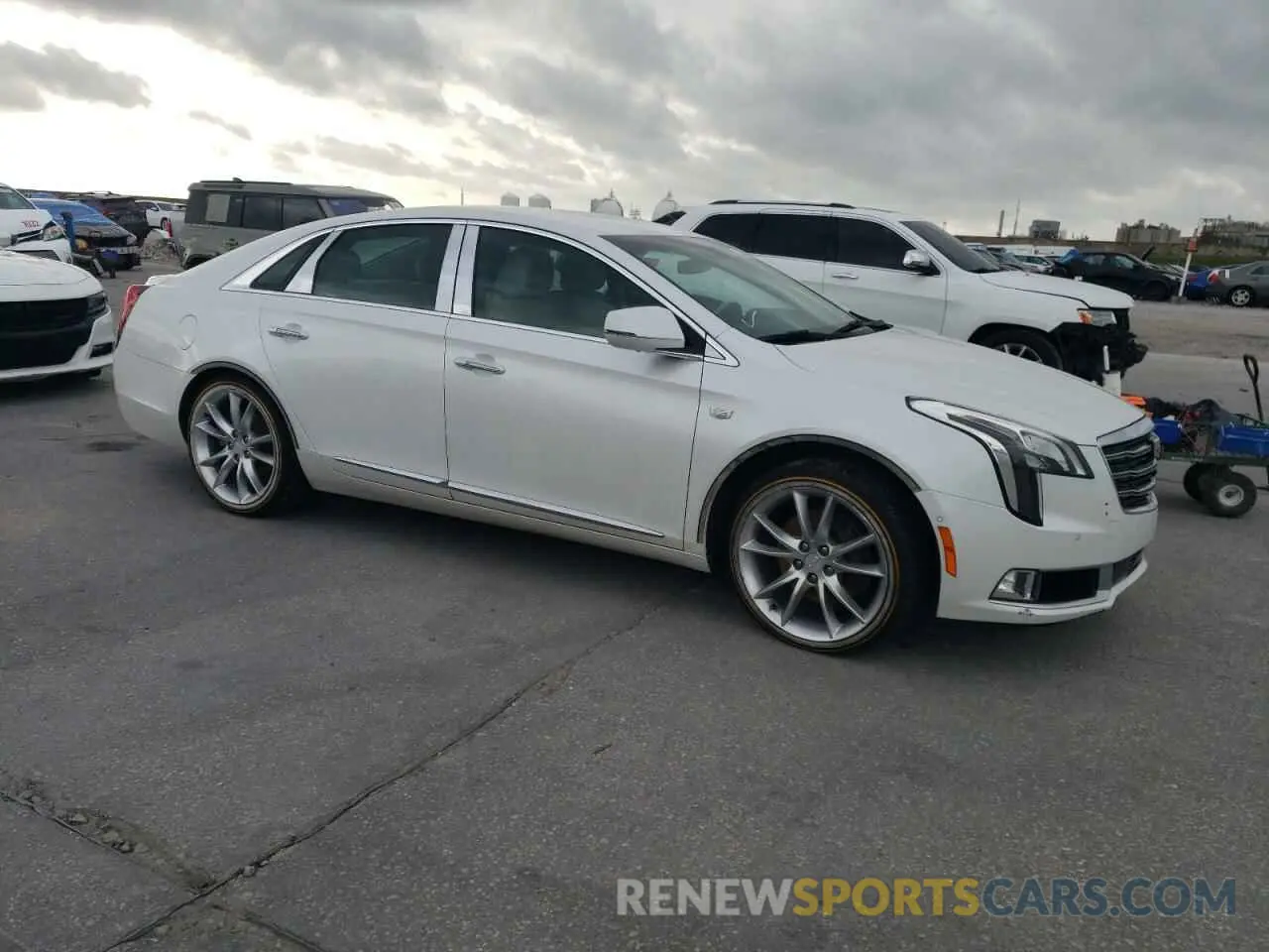 4 fotografías del automóvil dañado 2G61P5S3XK9138886 CADILLAC XTS 2019