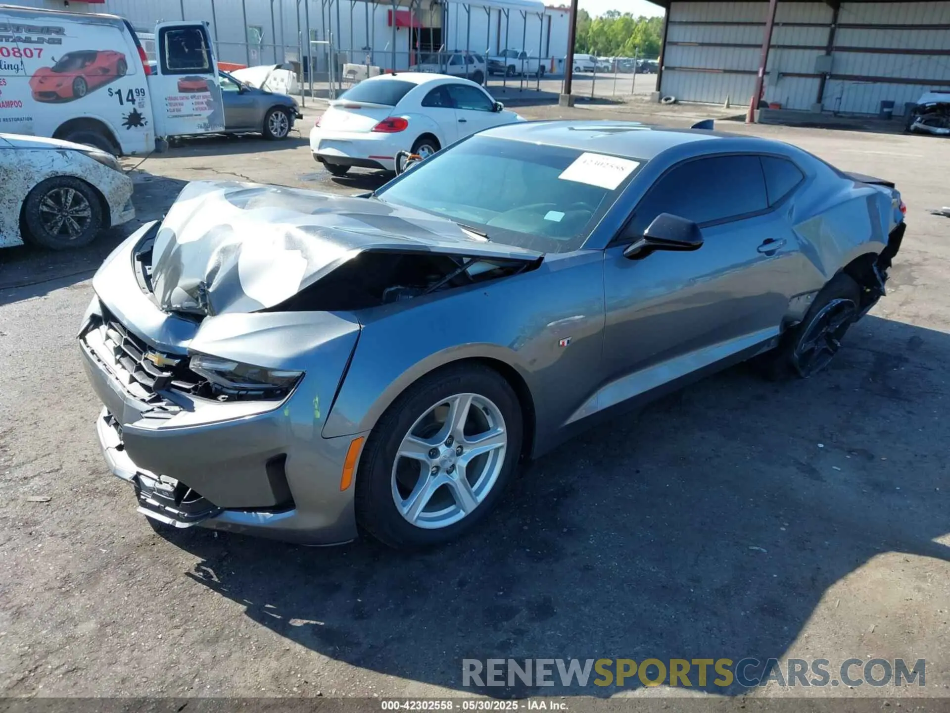 2 fotografías del automóvil dañado 1G1FB1RS6M0136517 CHEVROLET CAMARO 2021
