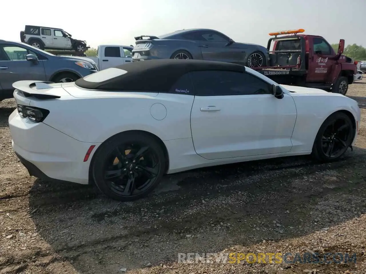 3 fotografías del automóvil dañado 1G1FB3DX5P0118643 CHEVROLET CAMARO 2023