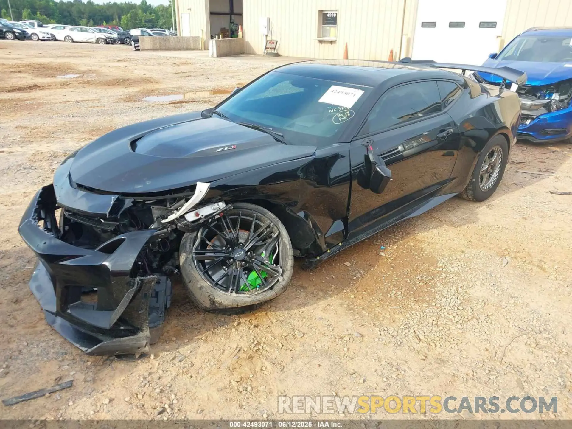2 fotografías del automóvil dañado 1G1FJ1R6XP0128477 CHEVROLET CAMARO 2023