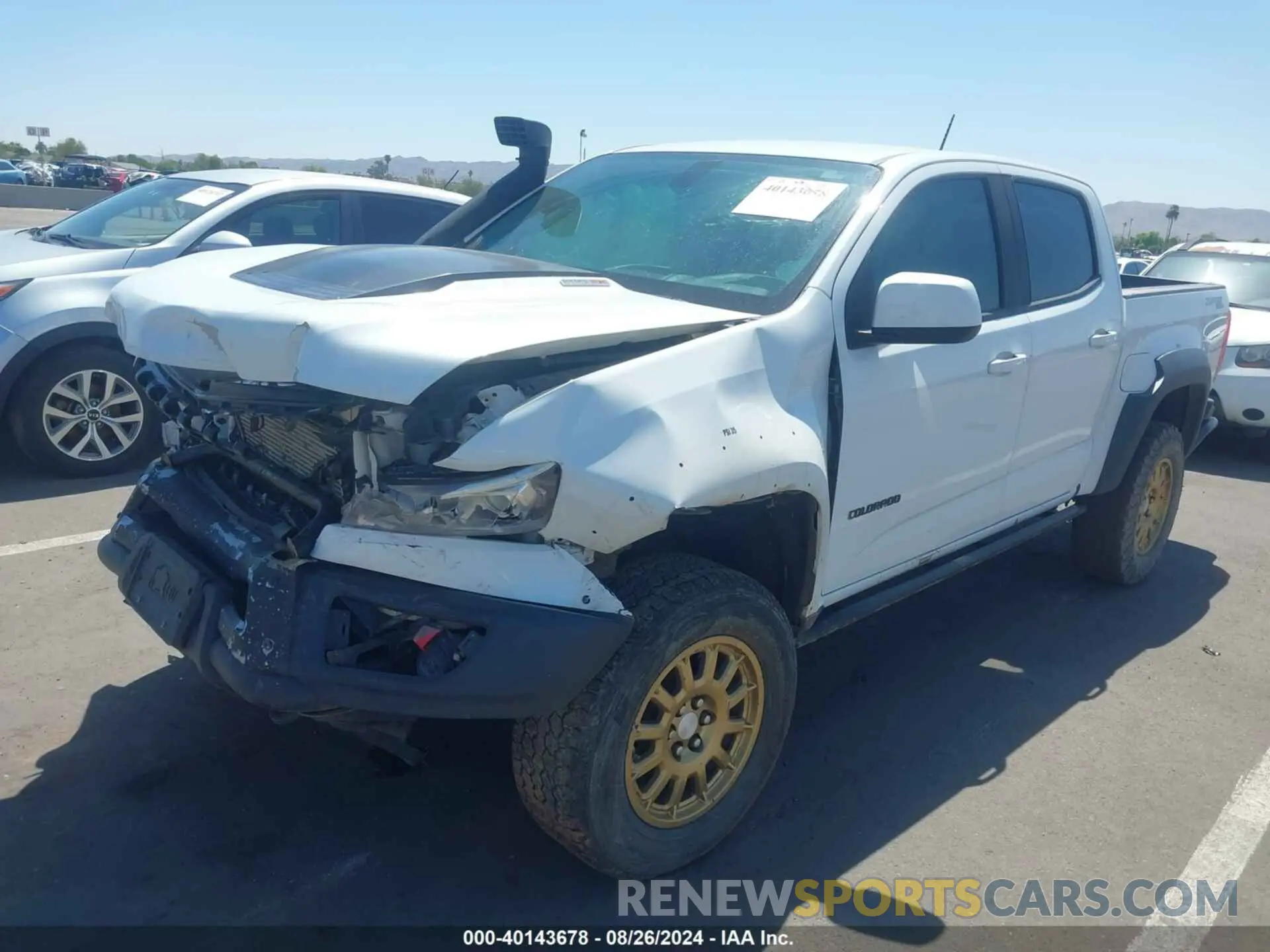 2 fotografías del automóvil dañado 1GCPTEE19L1113433 CHEVROLET COLORADO 2020