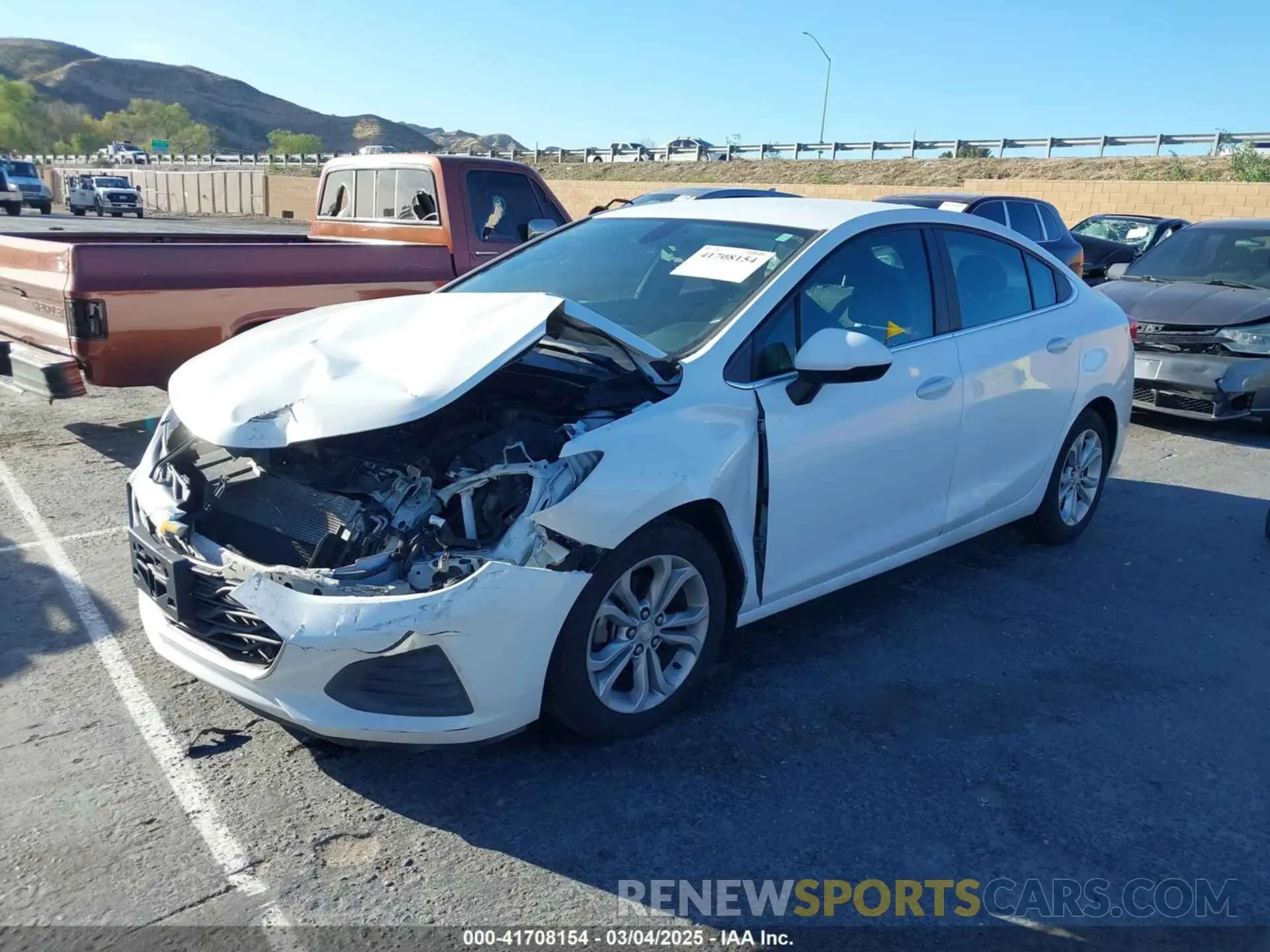 2 fotografías del automóvil dañado 1G1BE5SM0K7121251 CHEVROLET CRUZE 2019