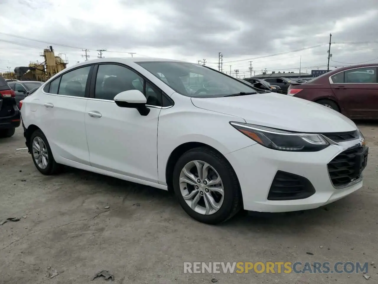 4 fotografías del automóvil dañado 1G1BE5SM1K7143582 CHEVROLET CRUZE 2019