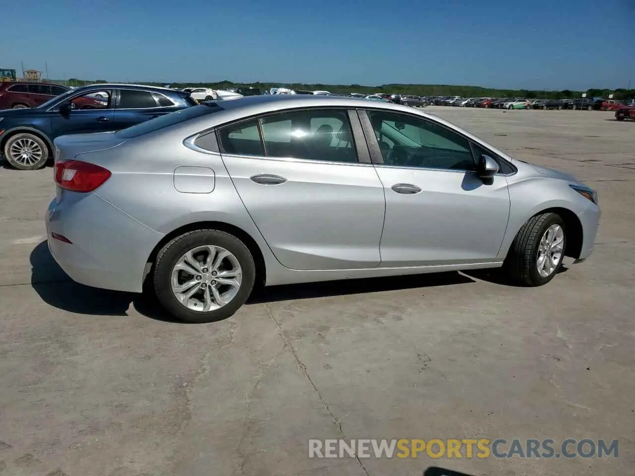 3 fotografías del automóvil dañado 1G1BE5SM3K7116786 CHEVROLET CRUZE 2019