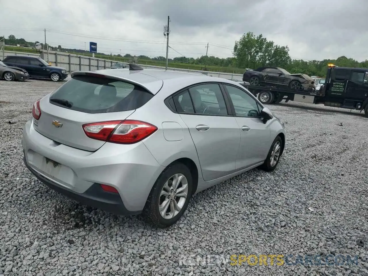 3 fotografías del automóvil dañado 3G1BC6SMXKS533058 CHEVROLET CRUZE 2019