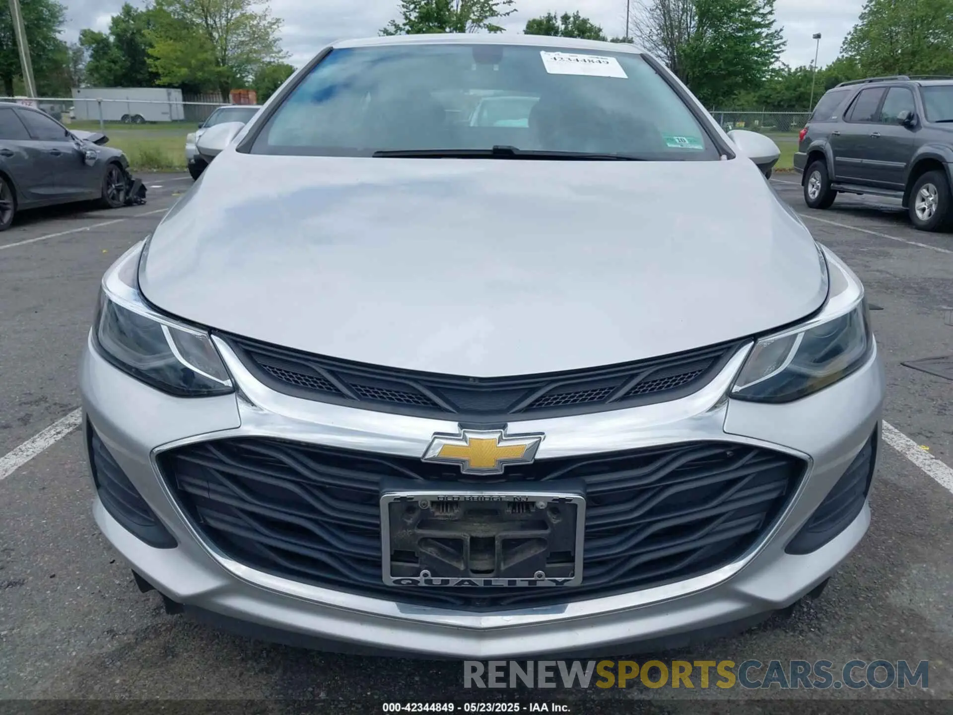 12 fotografías del automóvil dañado 3G1BE6SM0KS524394 CHEVROLET CRUZE 2019