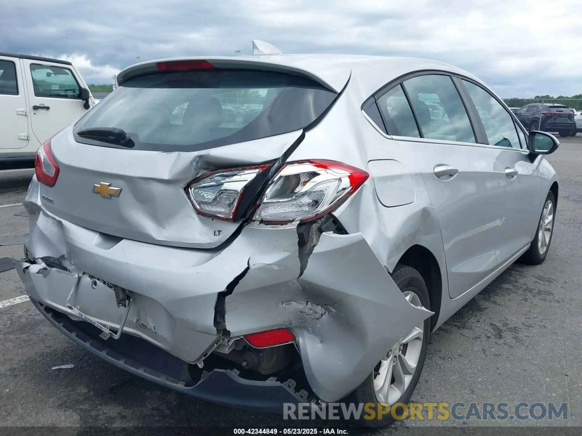 4 fotografías del automóvil dañado 3G1BE6SM0KS524394 CHEVROLET CRUZE 2019