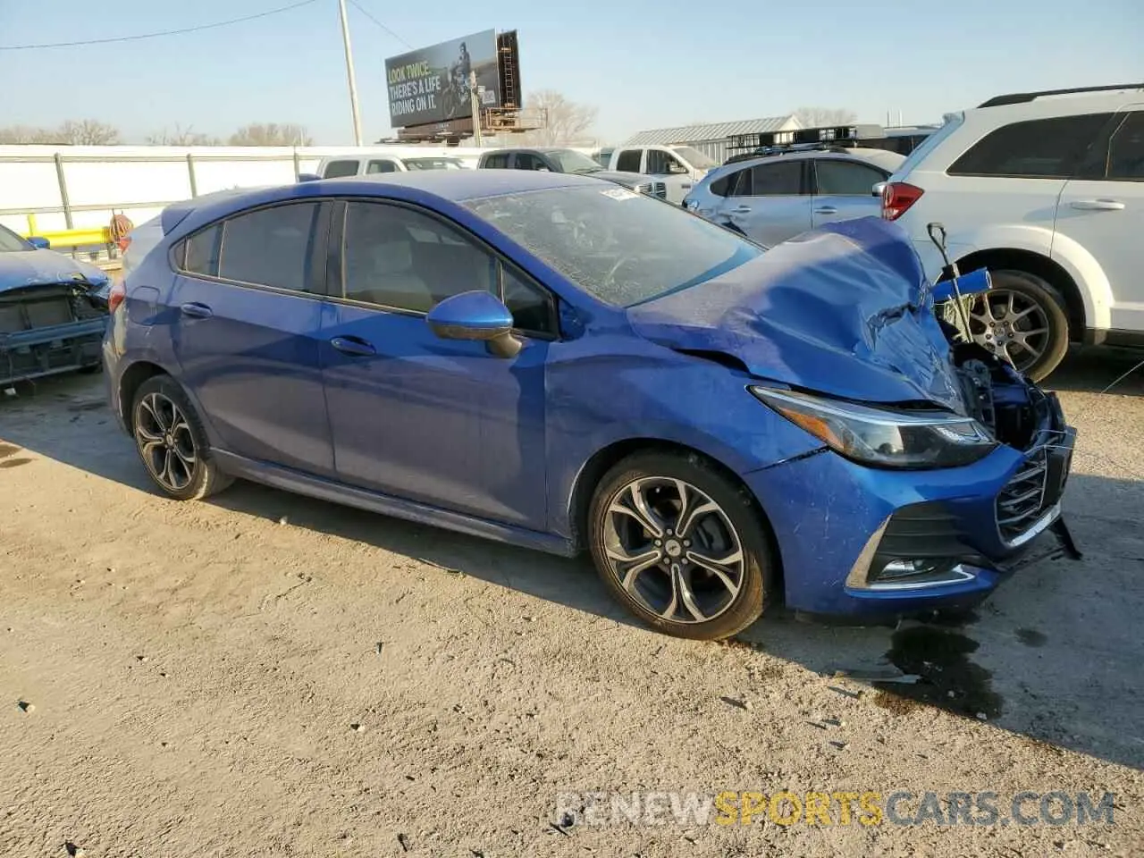 4 fotografías del automóvil dañado 3G1BE6SM1KS587469 CHEVROLET CRUZE 2019